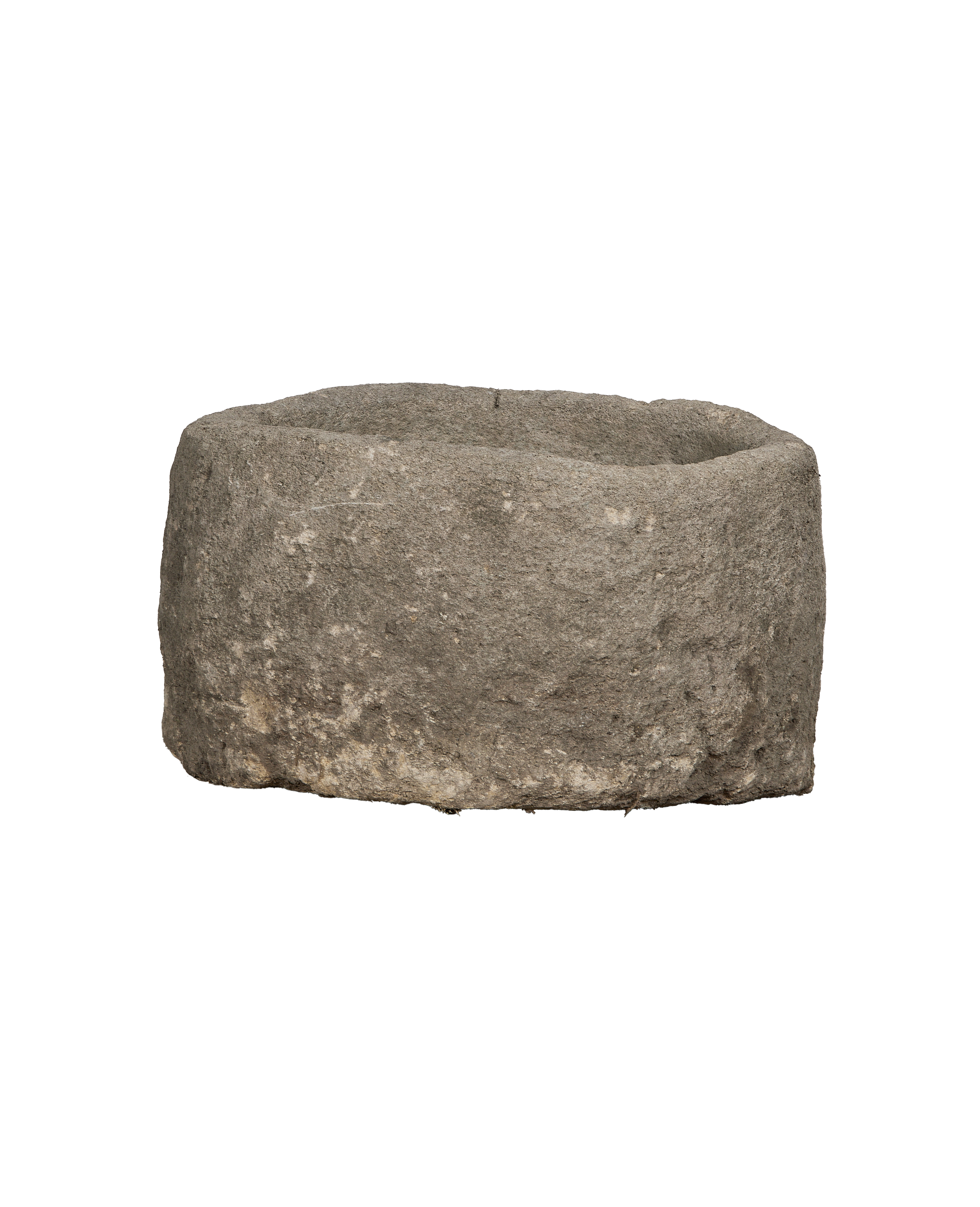 Vintage Indonesian limestone trough, showing the rustic rough texture and rounded shape from top view.