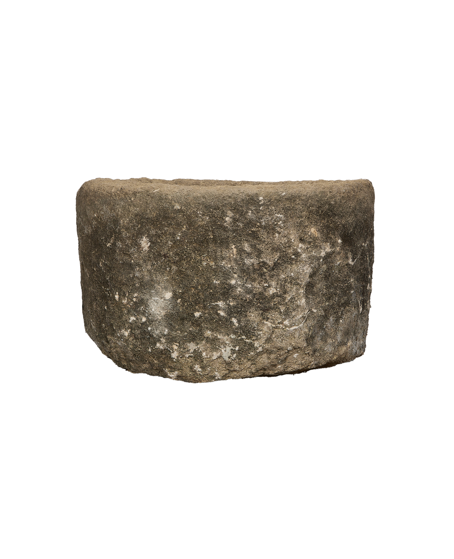 Round vintage Indonesian limestone trough, OAK finish, showing rough weathered texture.