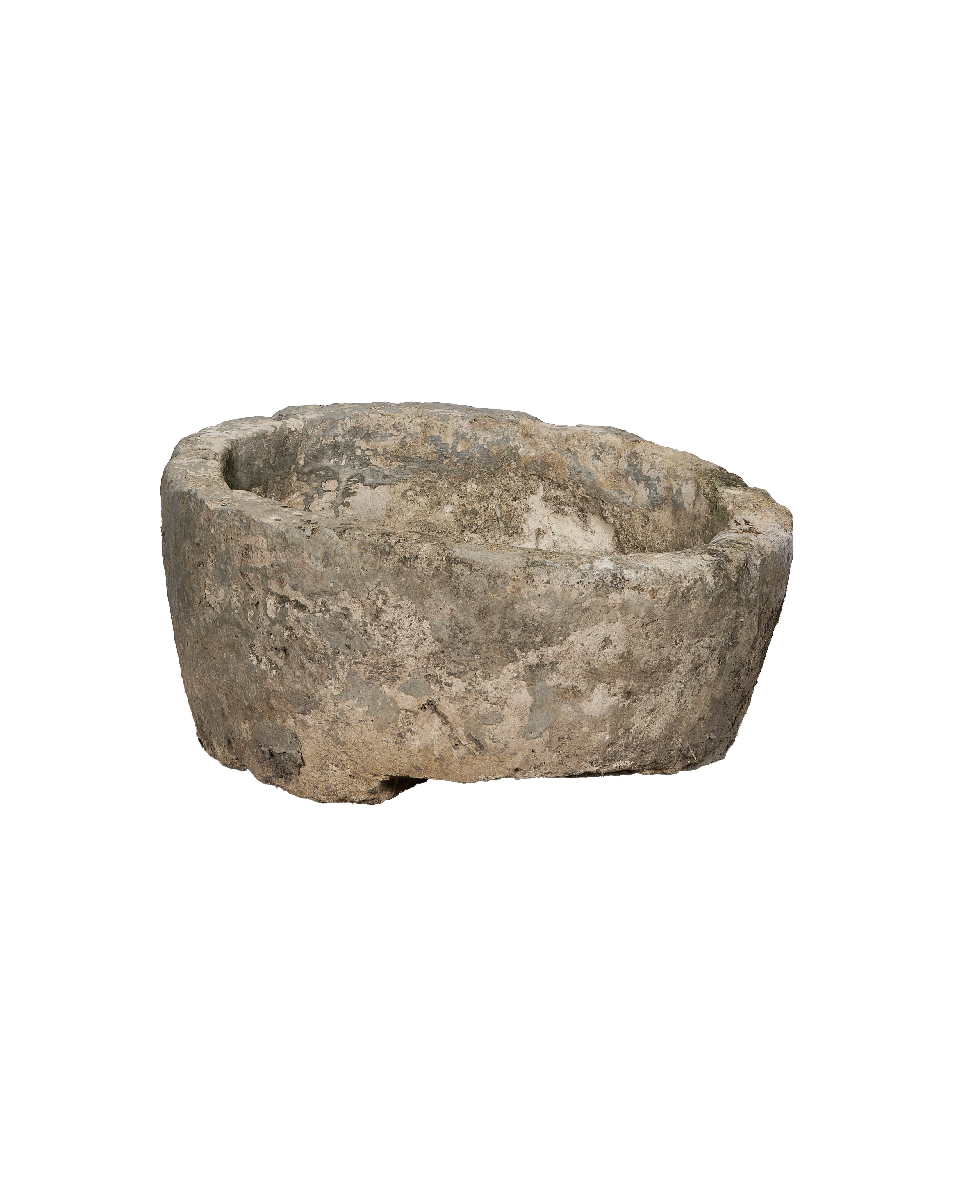 Vintage Indonesian limestone trough showcasing weathered texture and unique organic shape.
