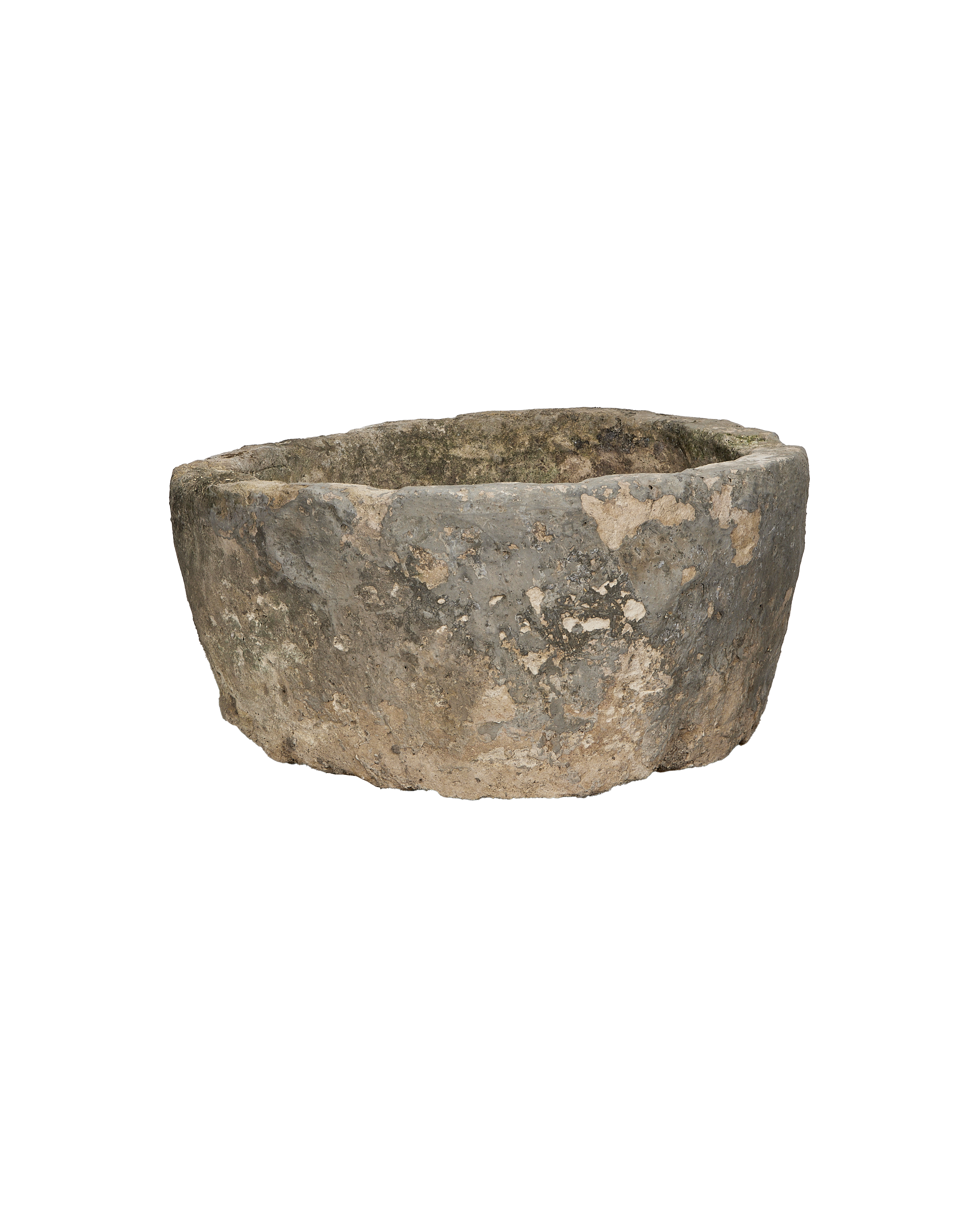 Vintage round limestone trough from Indonesia, showing rough, weathered exterior bottom and lip.