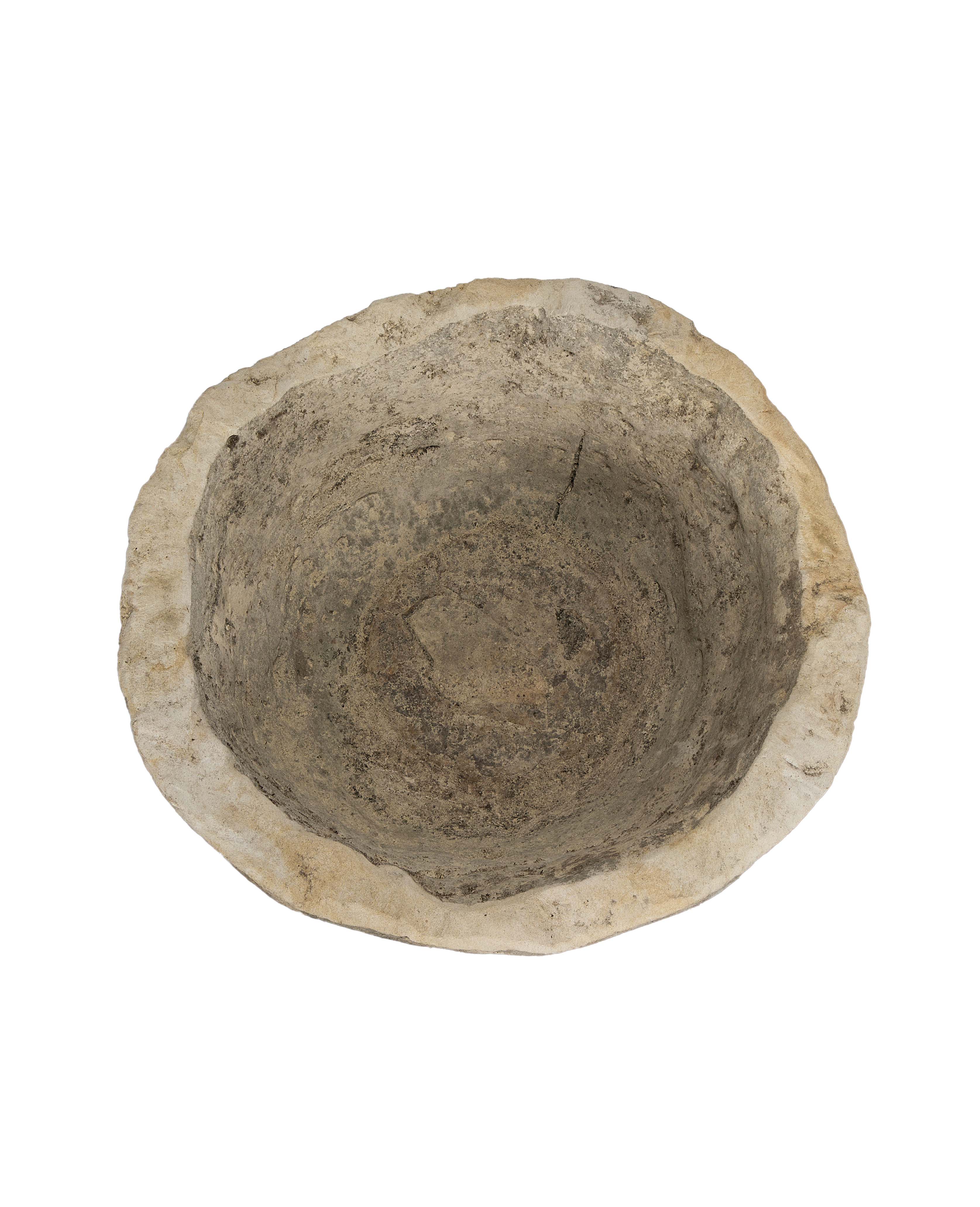 Vintage Indonesian round limestone trough, top-down view showing interior texture and aged character.