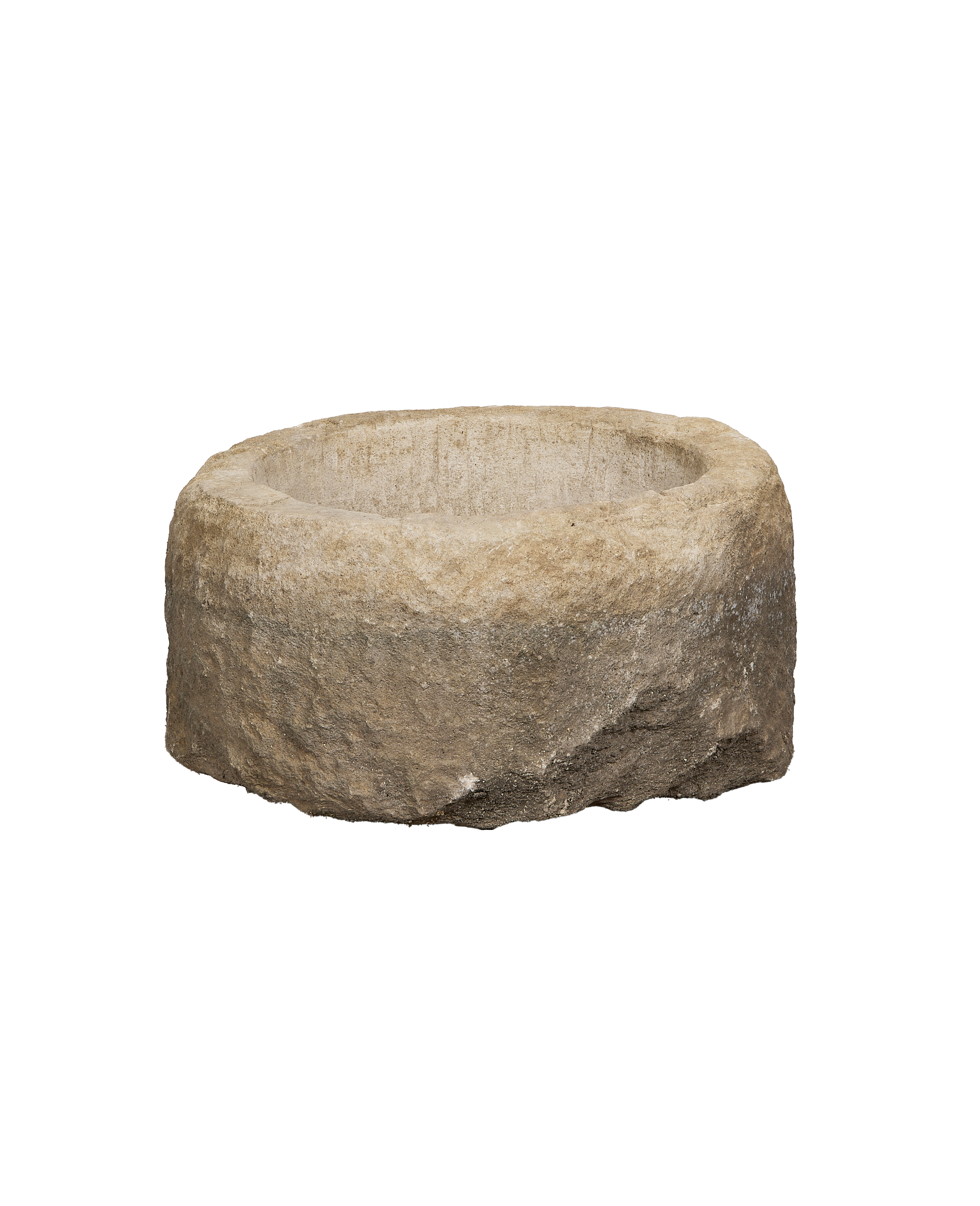 Vintage limestone trough from Indonesia, showing rough exterior texture and round interior.