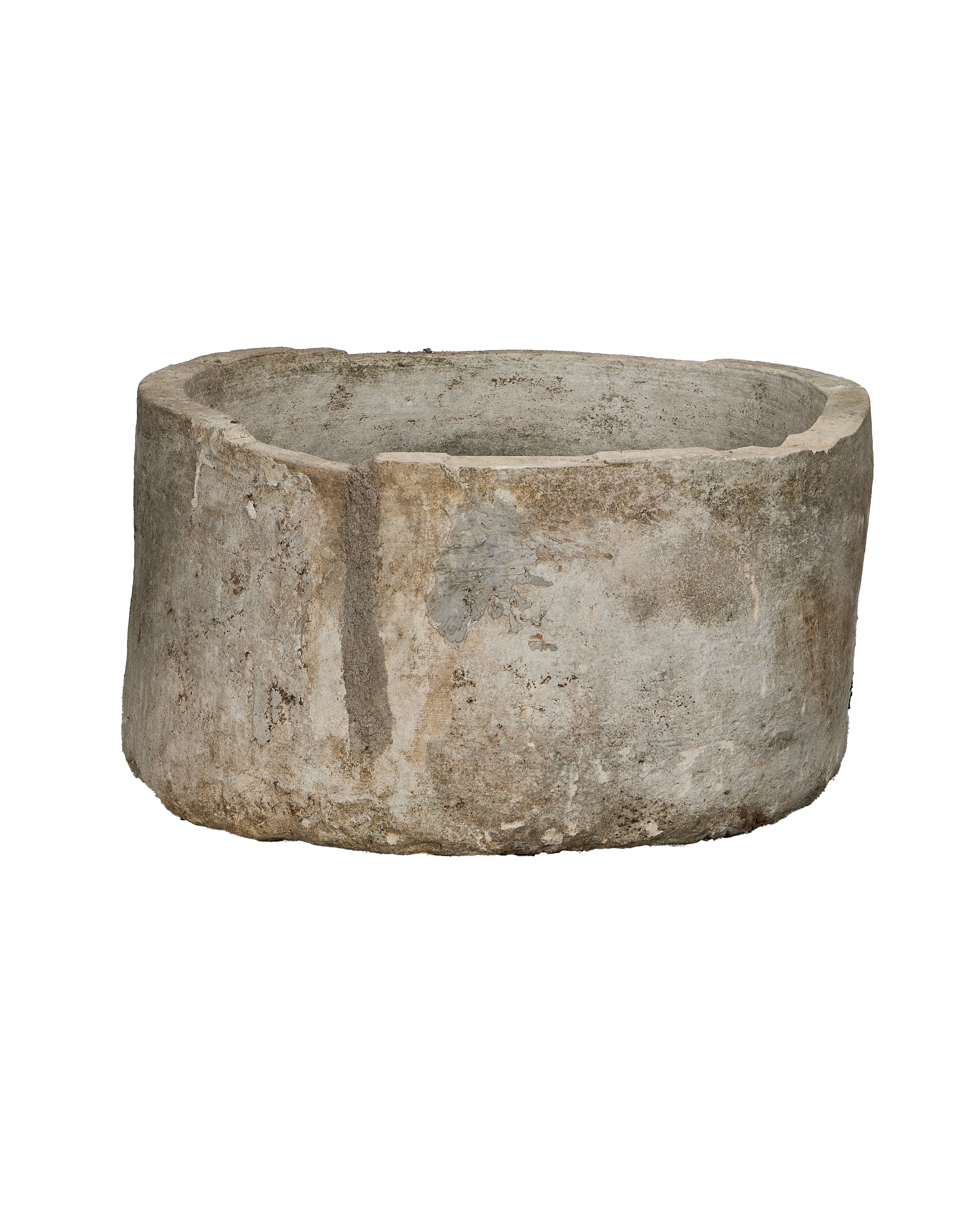 Vintage round Indonesian limestone trough, detailed view of textured weathered surface.