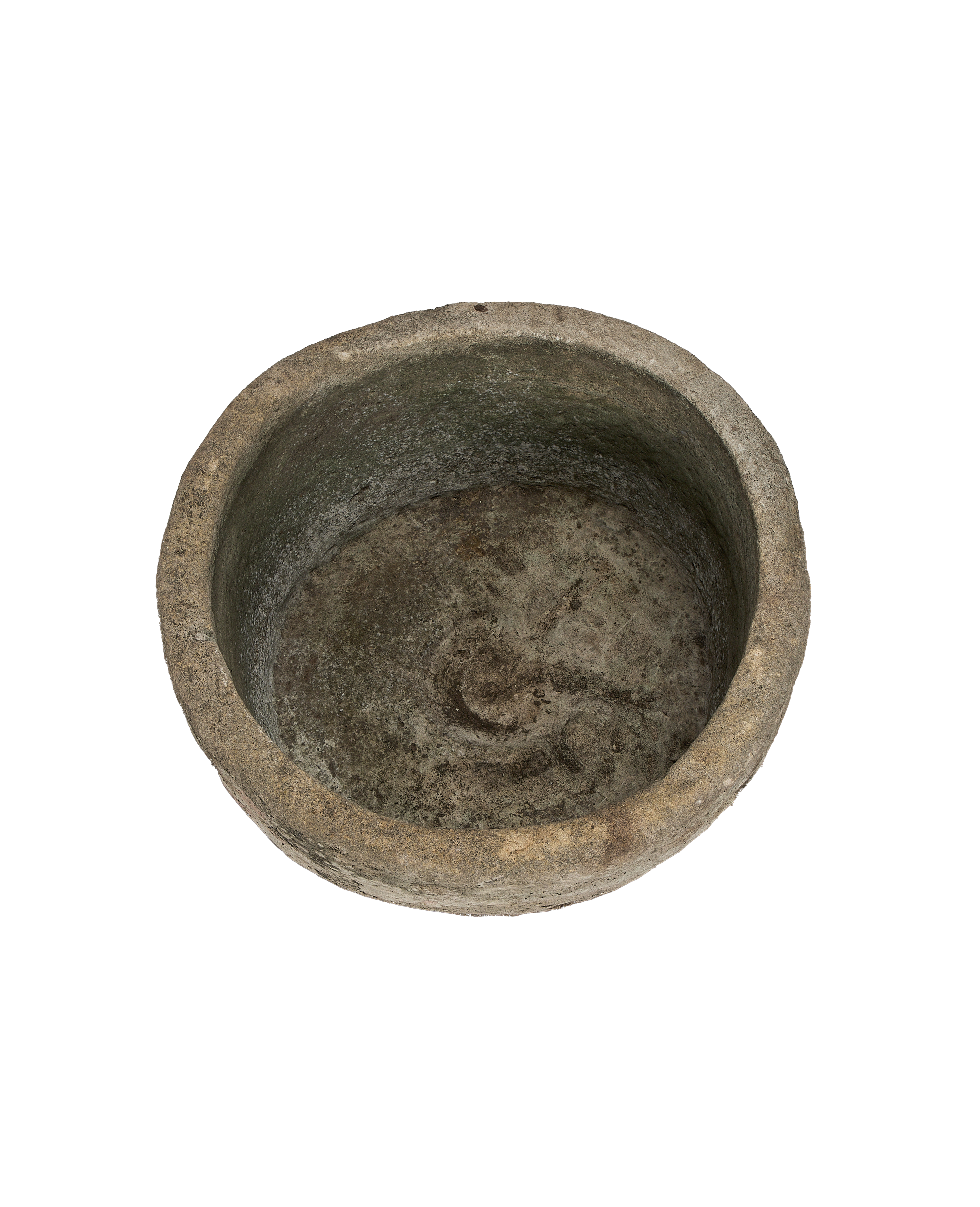 Vintage round limestone trough, aged texture, showing interior basin and eroded rim from above.