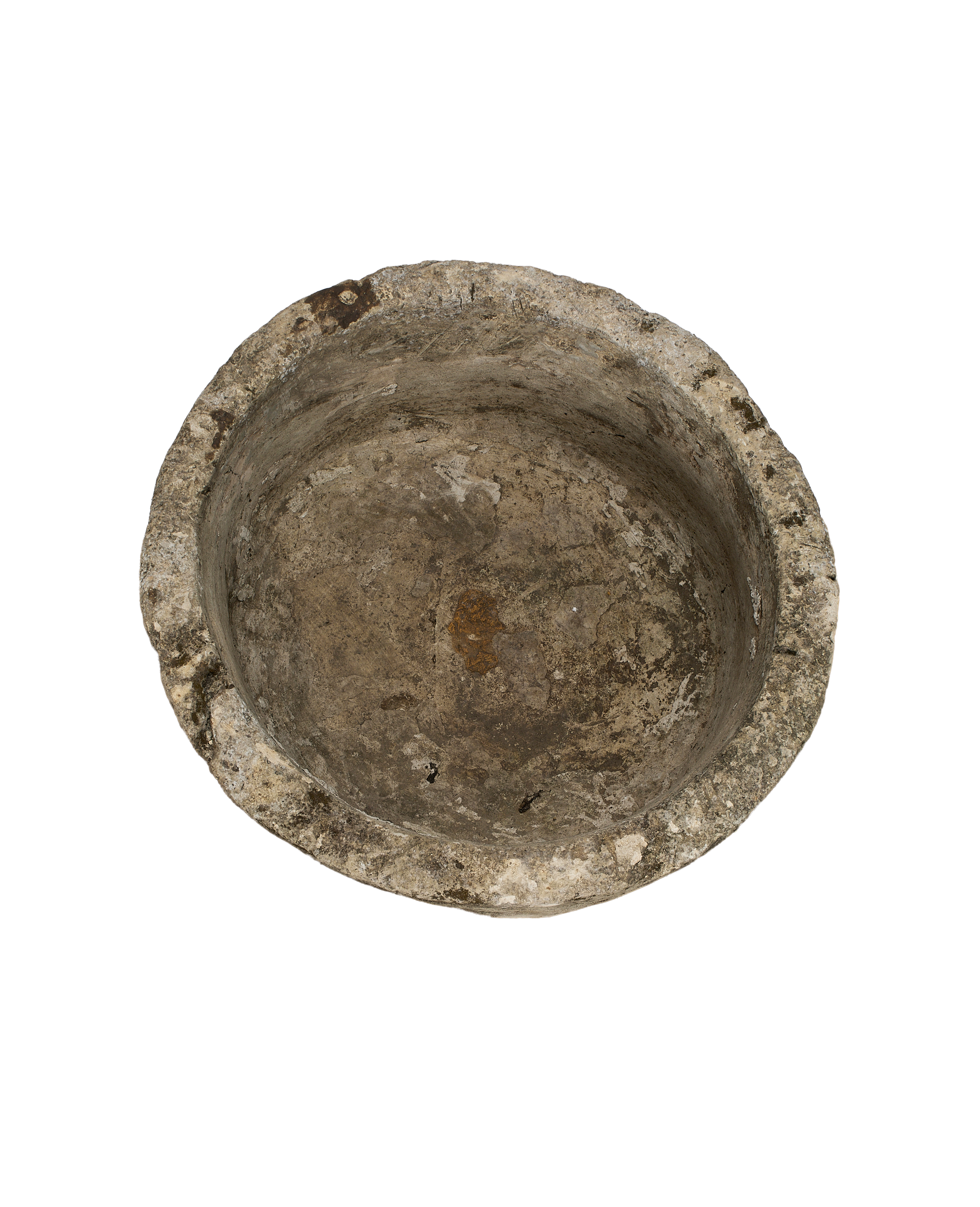 Vintage Indonesian round limestone trough, top-down view showing interior's weathered texture and moss remnants.