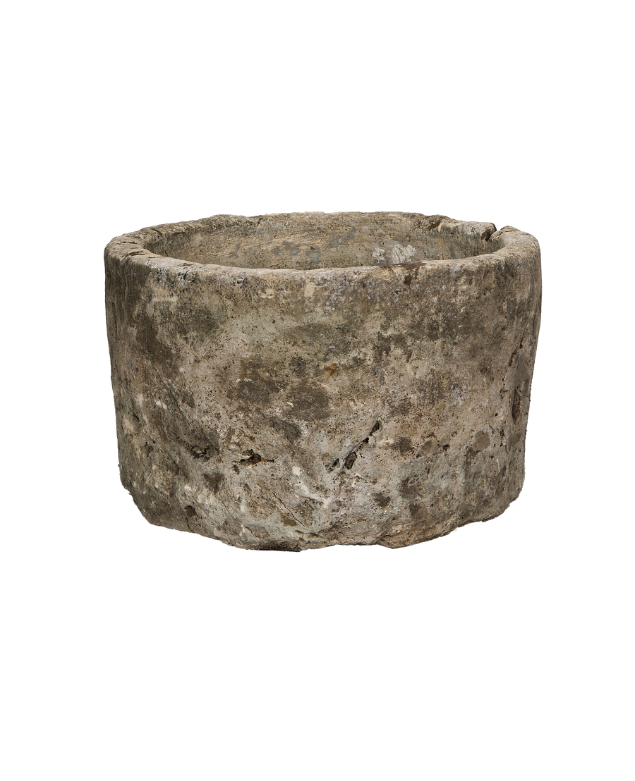 Round vintage limestone trough from Indonesia, showcasing weathered texture and natural imperfections from an elevated perspective.