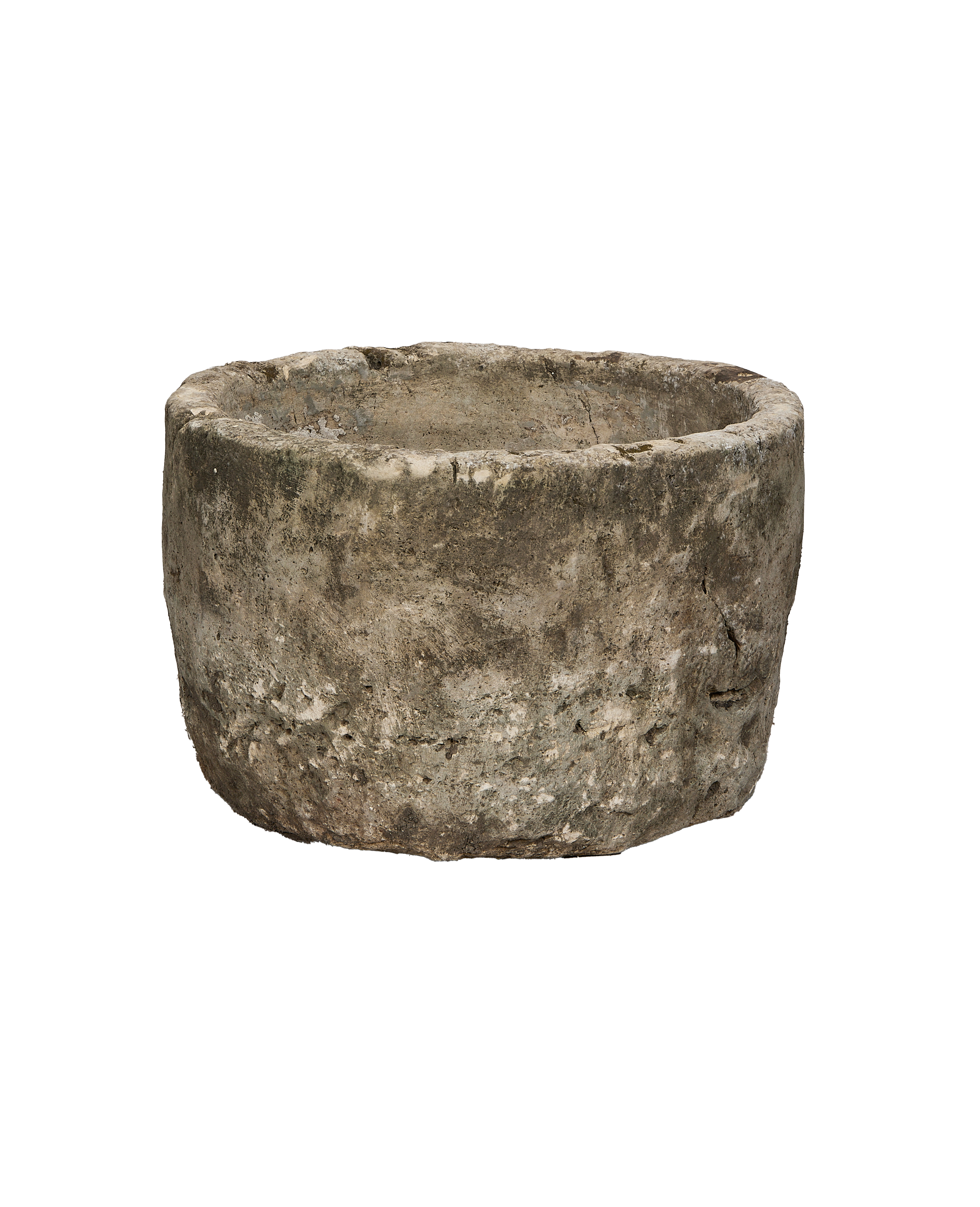 Vintage round Indonesian limestone trough, showing weathered texture from above angle.