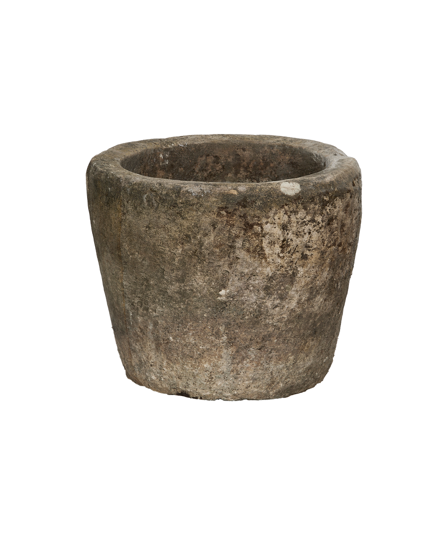 Vintage Indonesian limestone trough, round, showcasing worn texture and weathered patina.