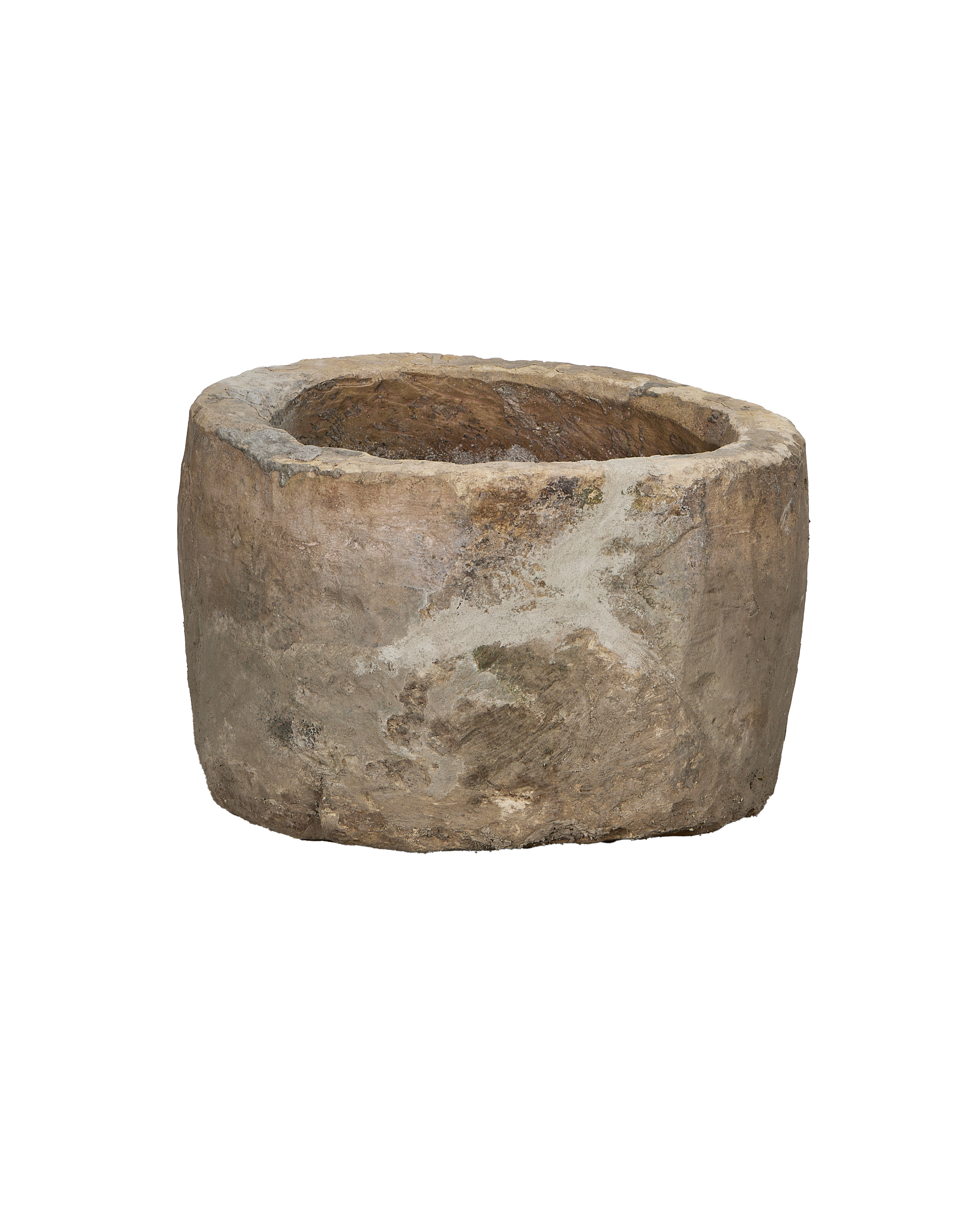 Vintage round limestone trough, showing its aged rustic surface and Indonesian origins.