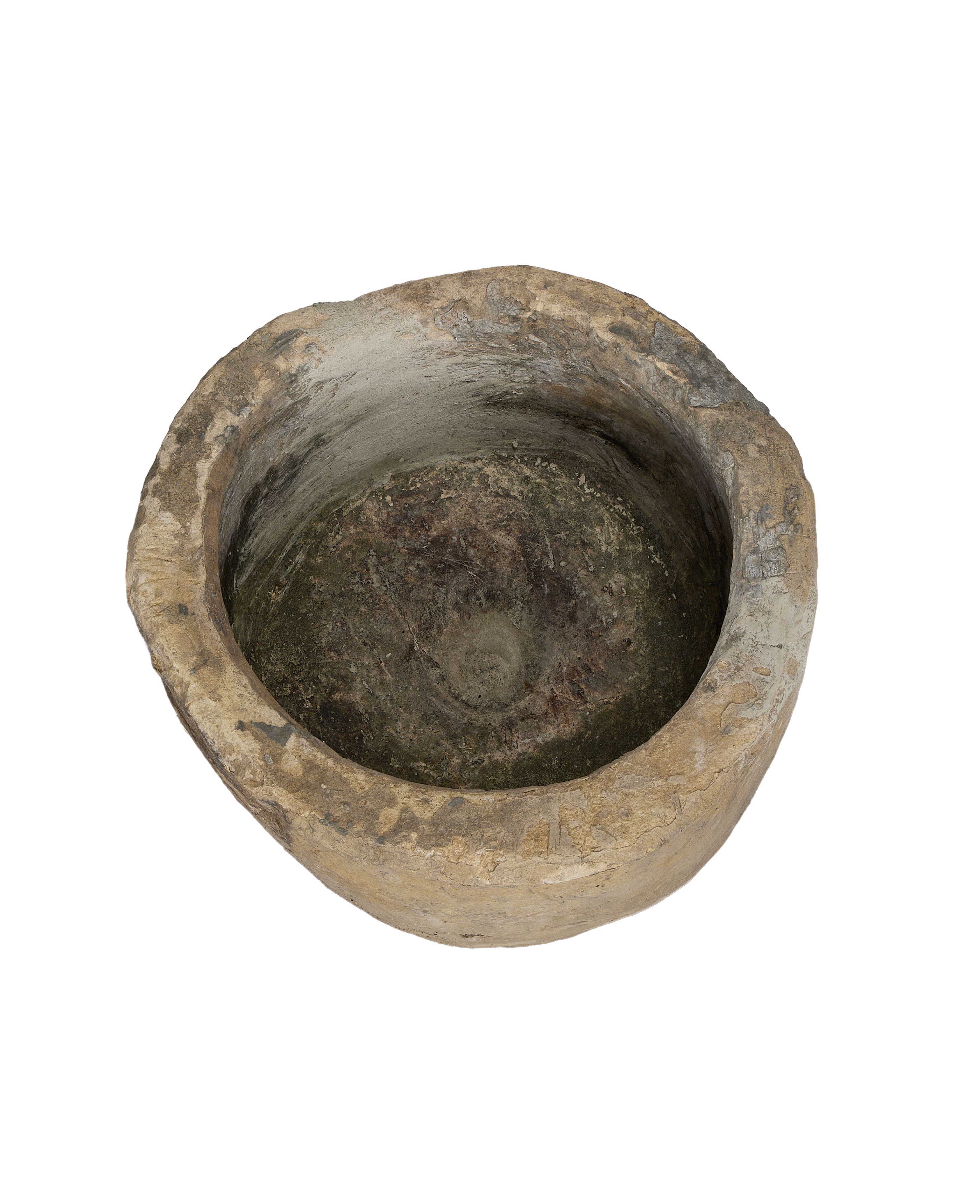 Vintage Indonesian limestone trough, top-down view highlighting the round shape and weathered interior.