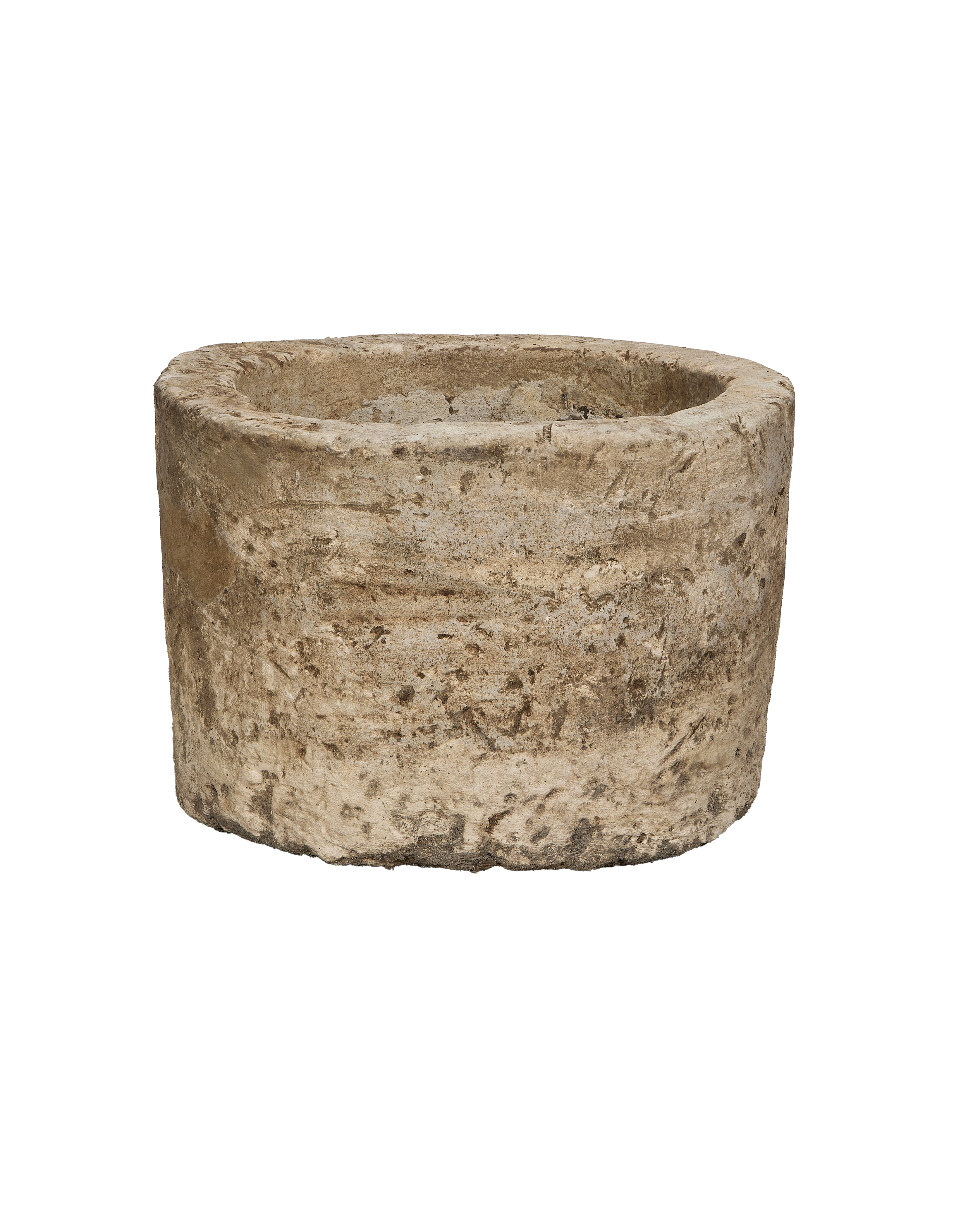 Vintage round Indonesian limestone trough, showing a full, weathered exterior.