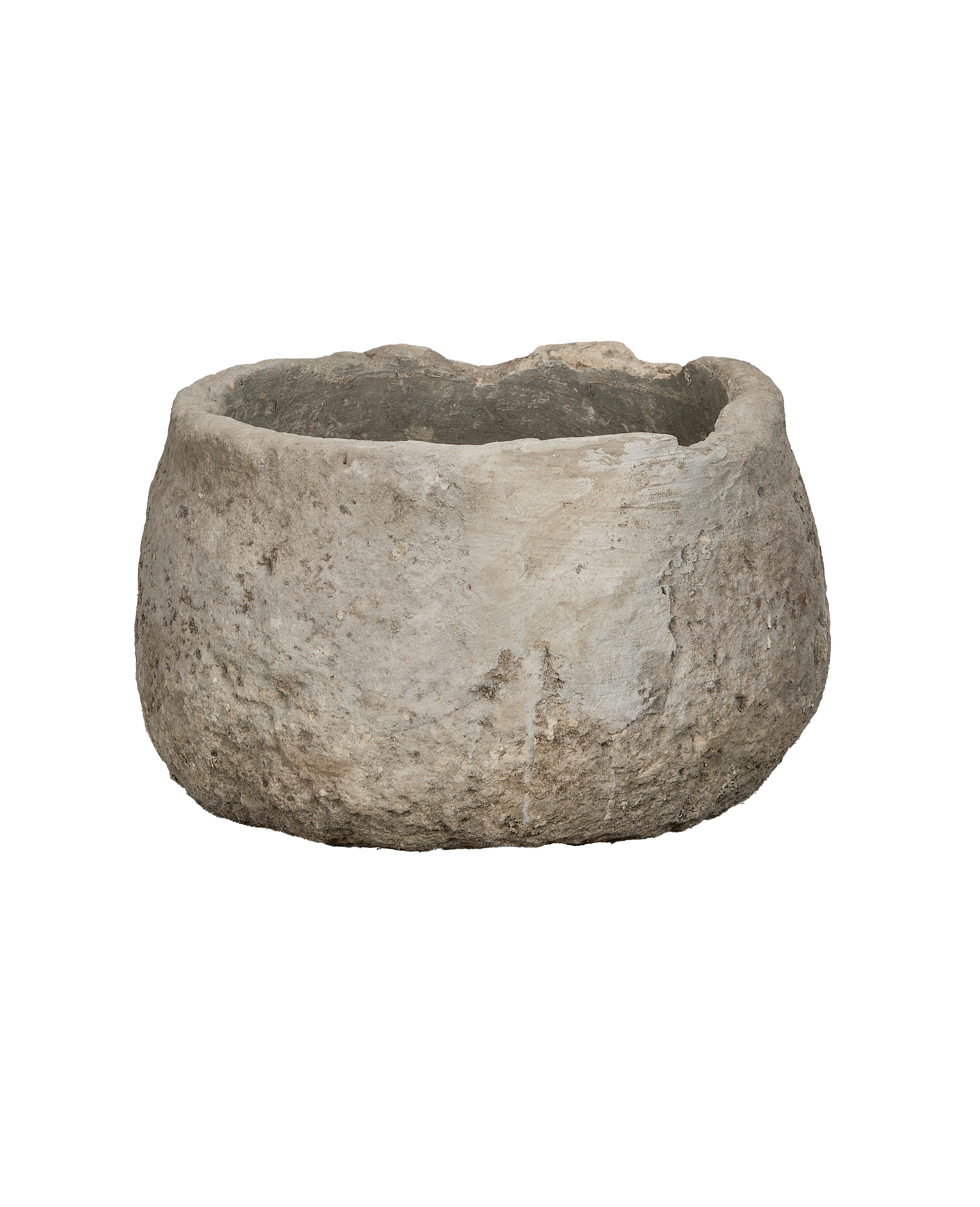 Vintage round limestone trough from Indonesia, showcasing rough texture and aged patina.