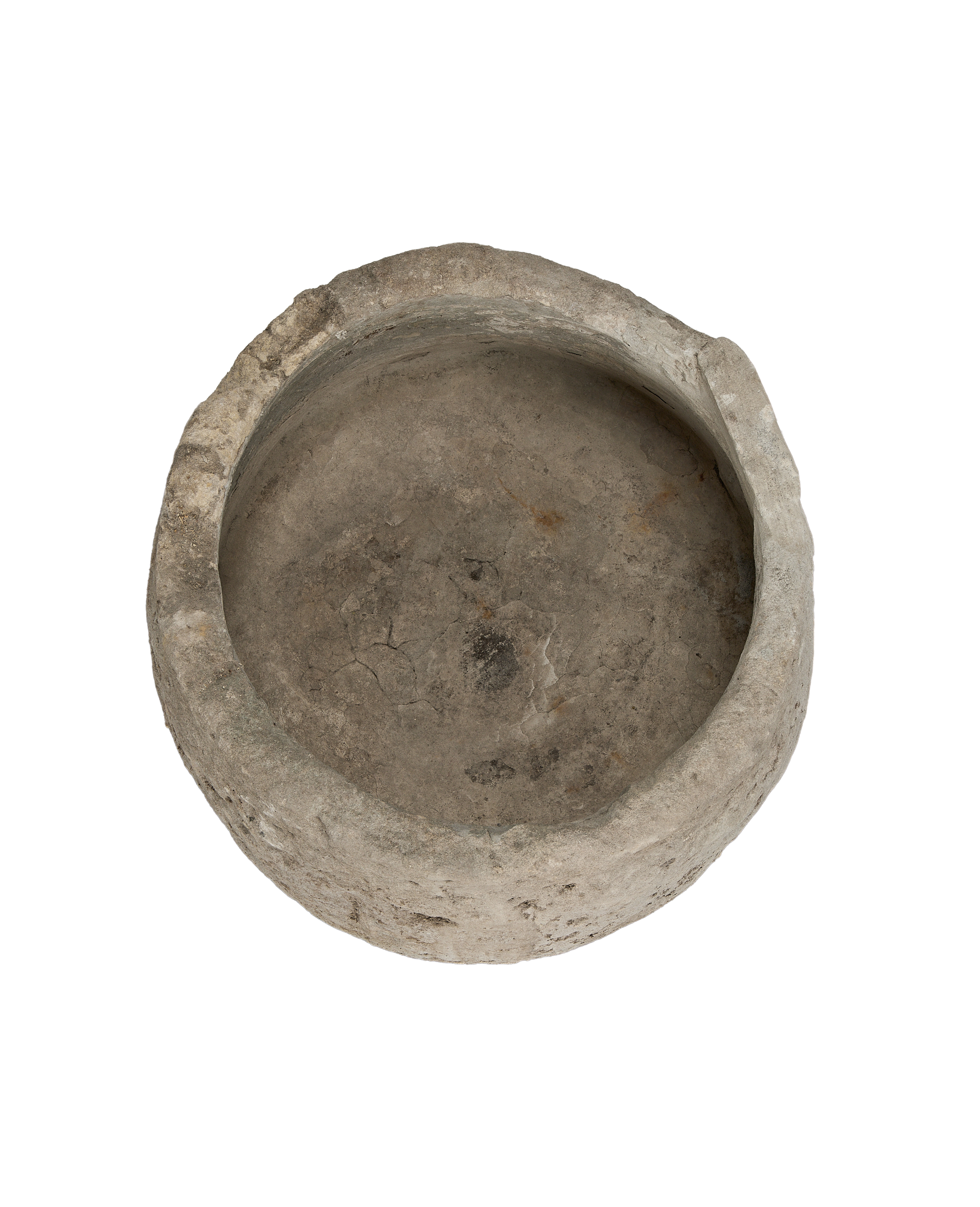 Vintage round limestone trough from Indonesia, top-down view showing interior texture and worn rim.