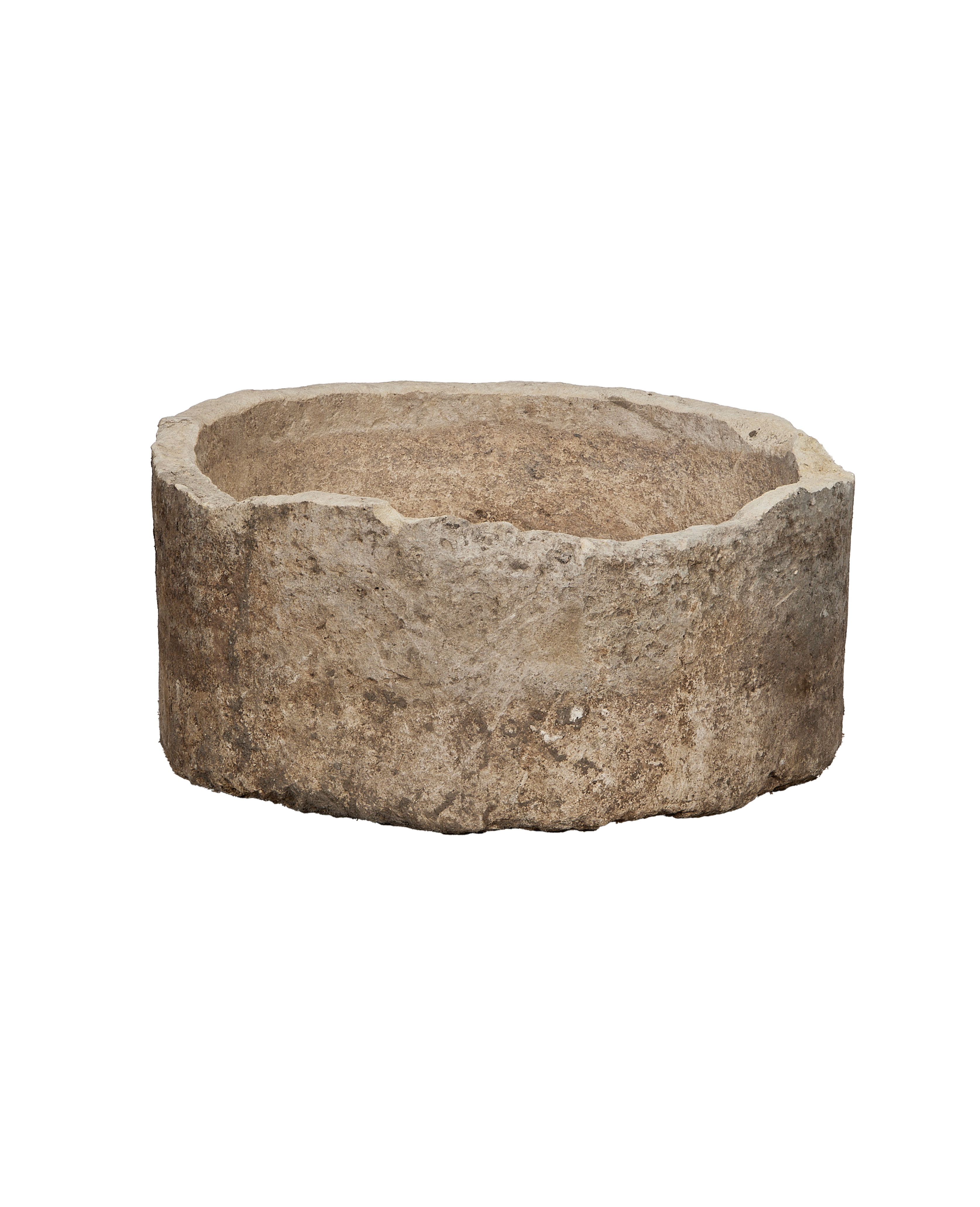 Vintage round limestone trough from Indonesia with rugged texture and aged patina.