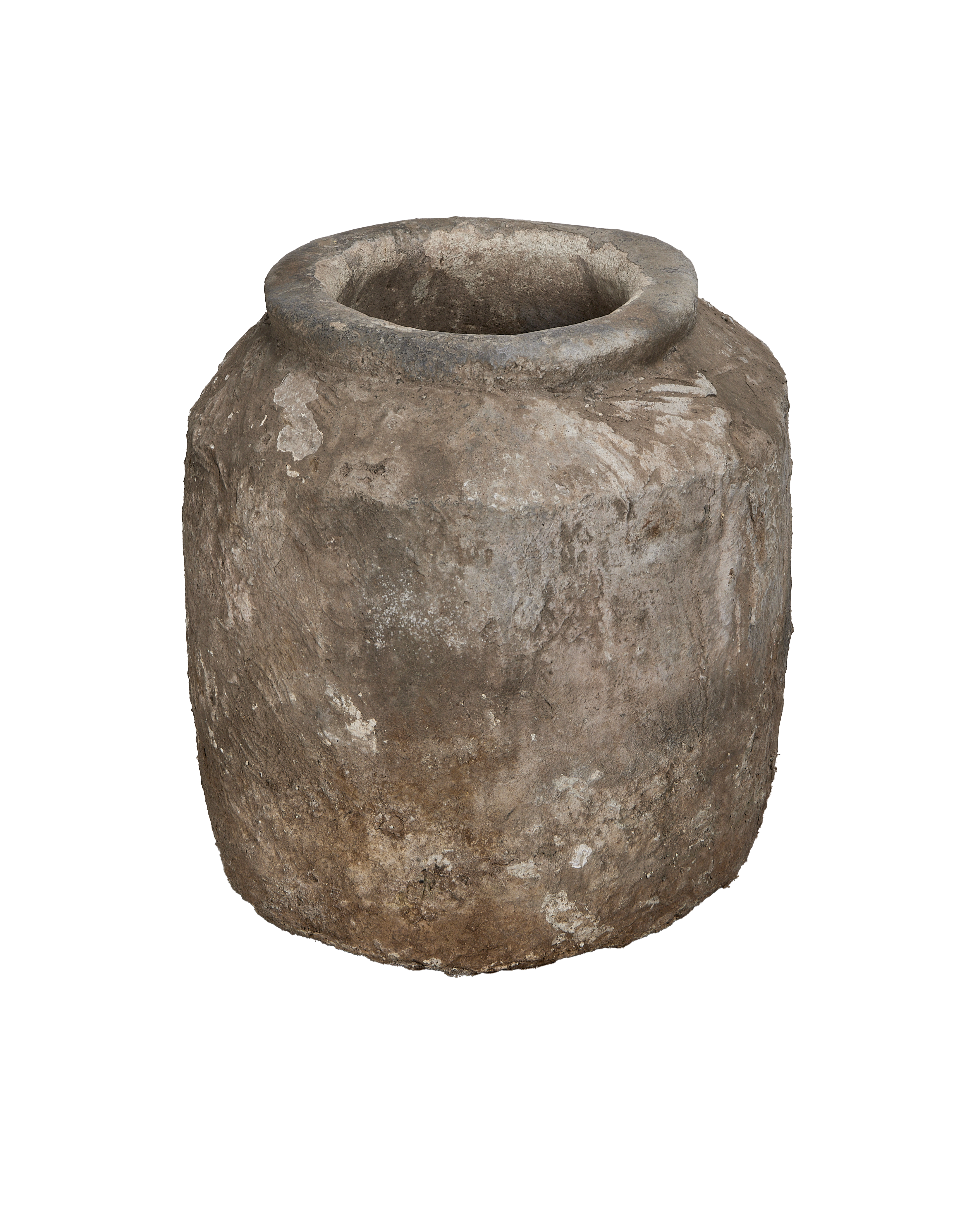 Vintage Indonesian limestone pot's rough, weathered exterior texture and robust rim.