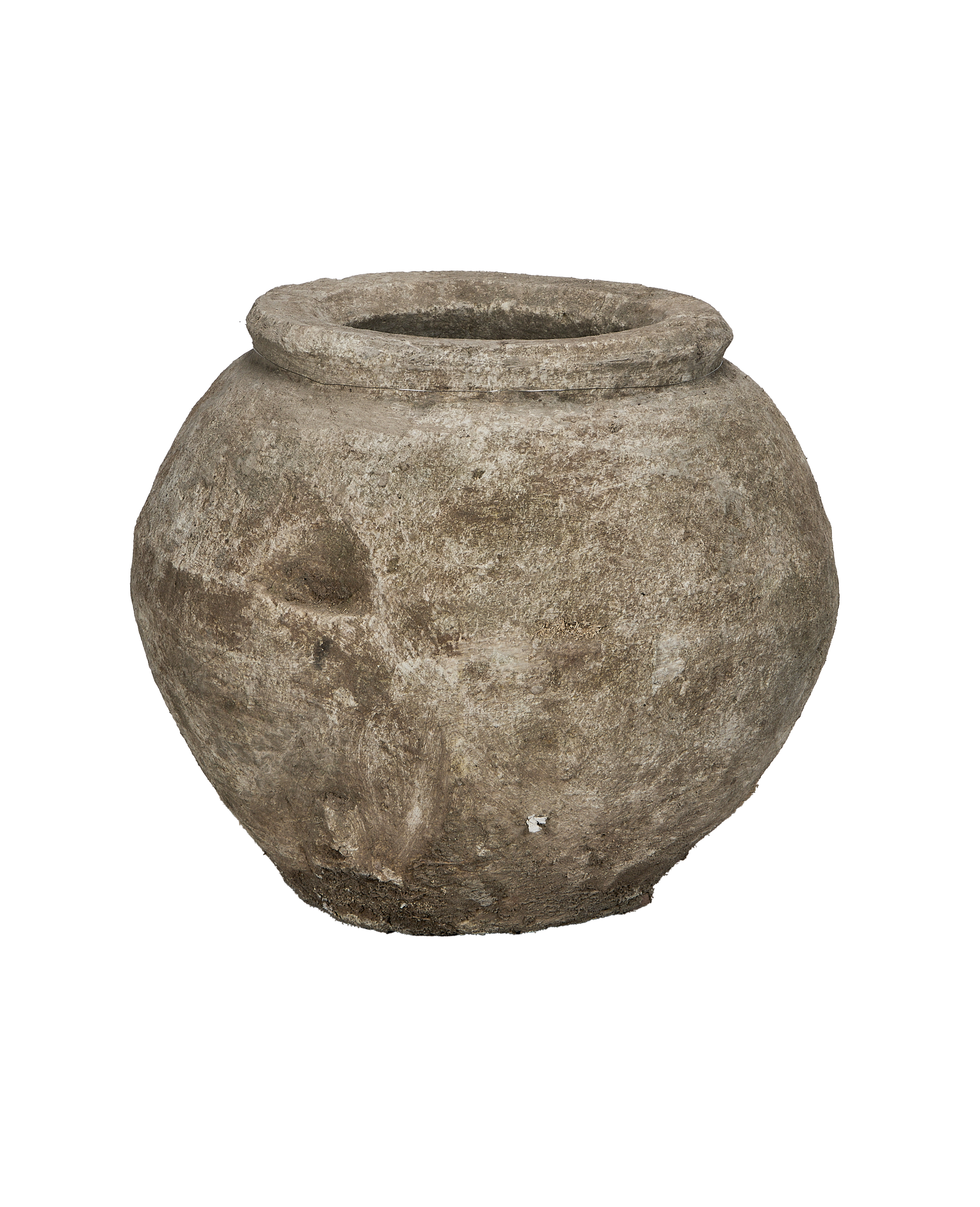 Vintage Indonesian limestone pot's unique weathered texture and rounded details from an angle.