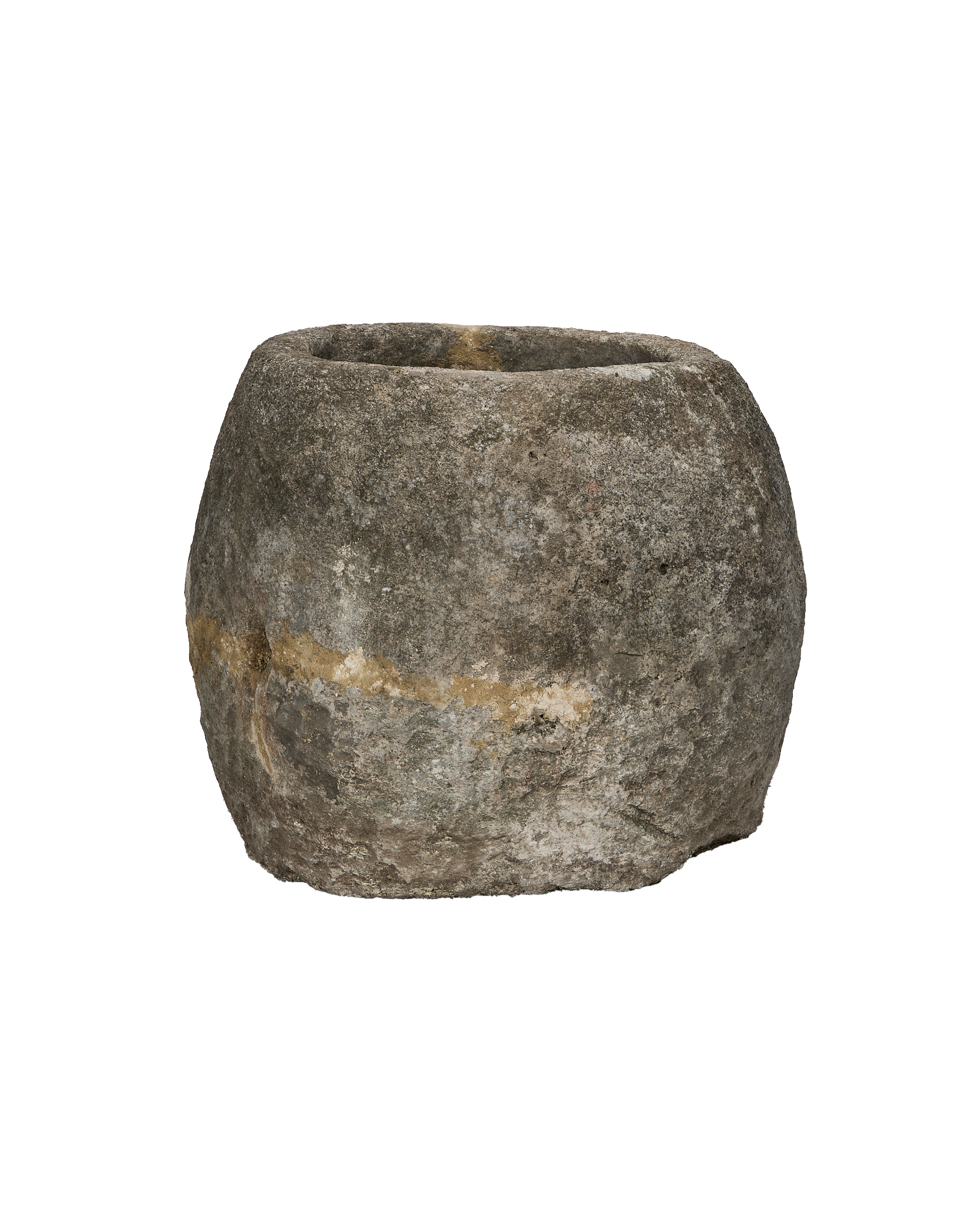 Vintage Indonesian round limestone trough, naturally weathered with visible golden striations and varied textures.