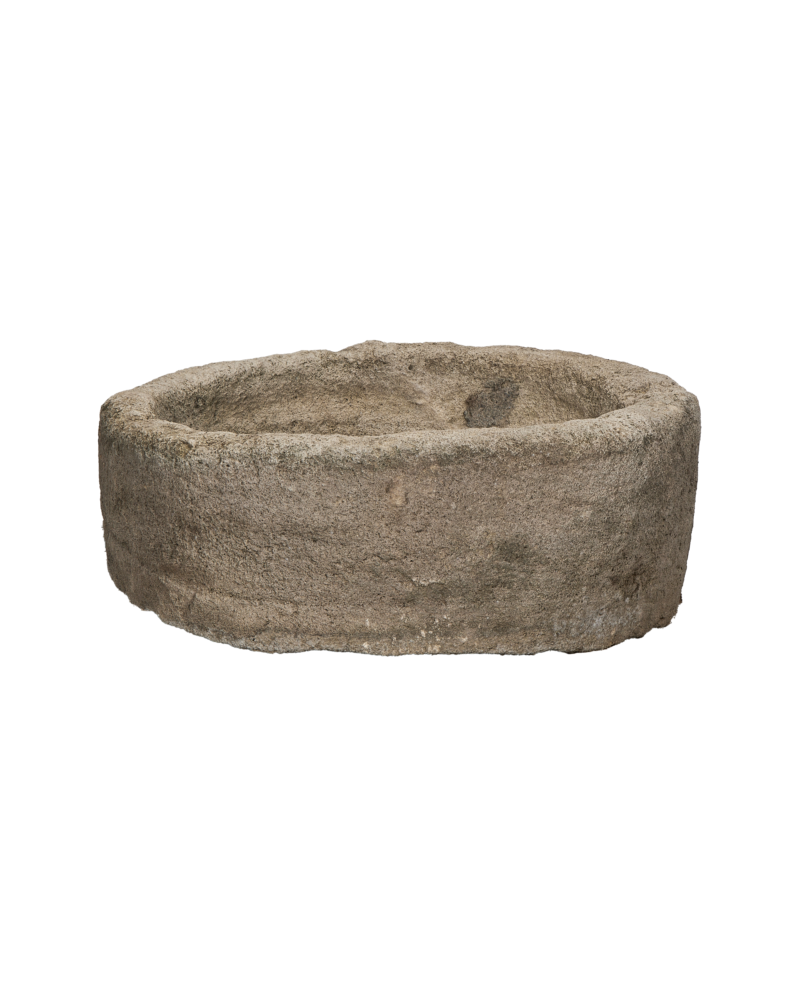 Vintage round limestone trough from Indonesia, showing rough texture and weathered condition detail.