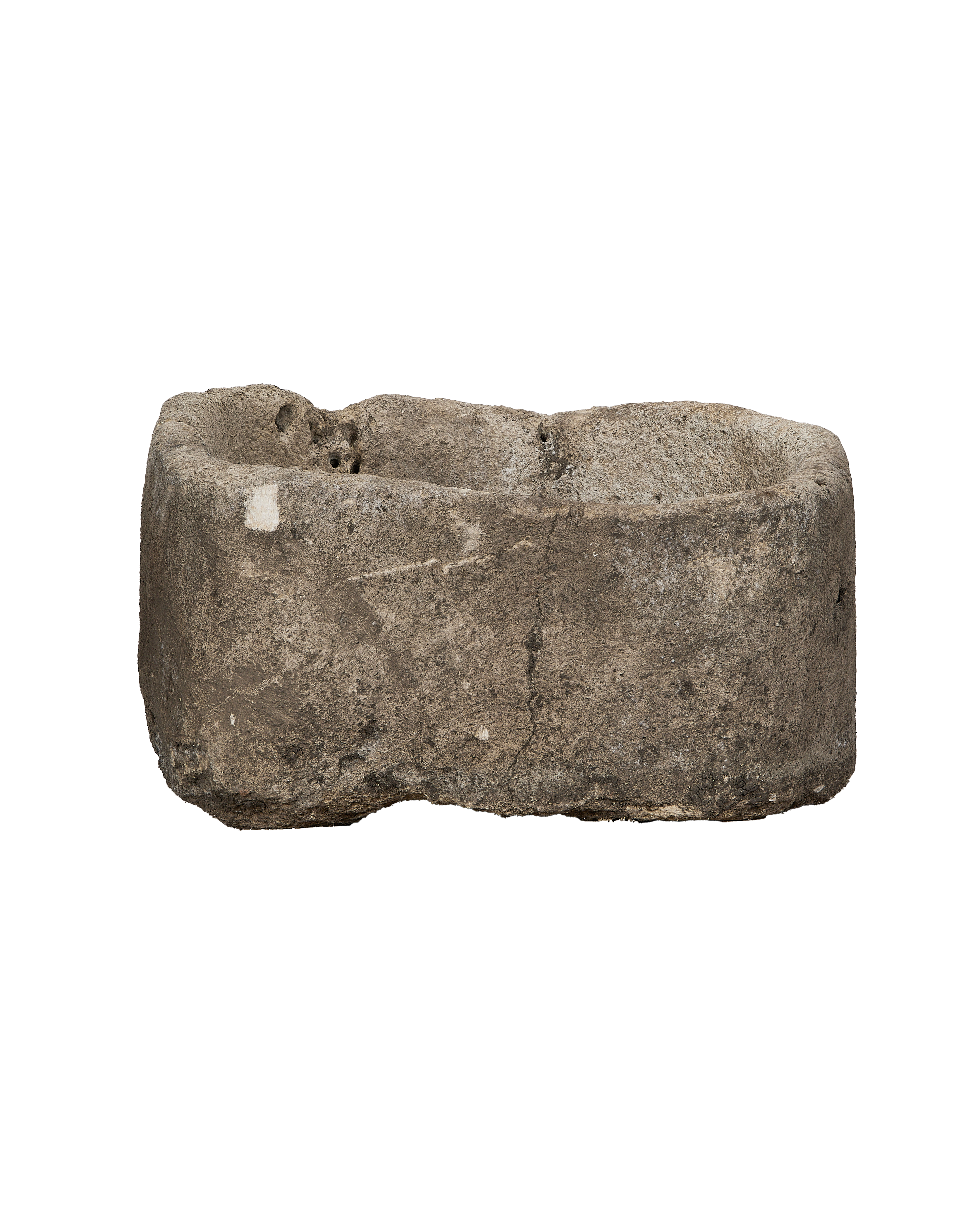 Vintage oblong limestone trough from Indonesia with rugged texture and natural wear.
