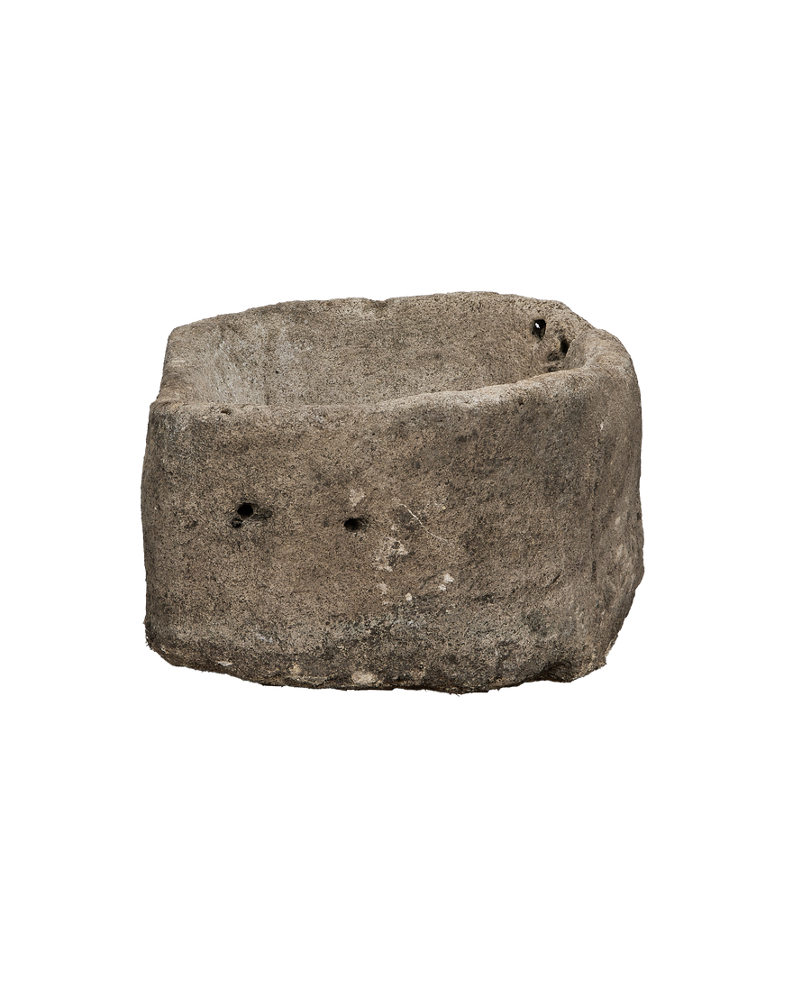 Vintage Indonesian limestone trough, top view shows weathered interior with textured surface.