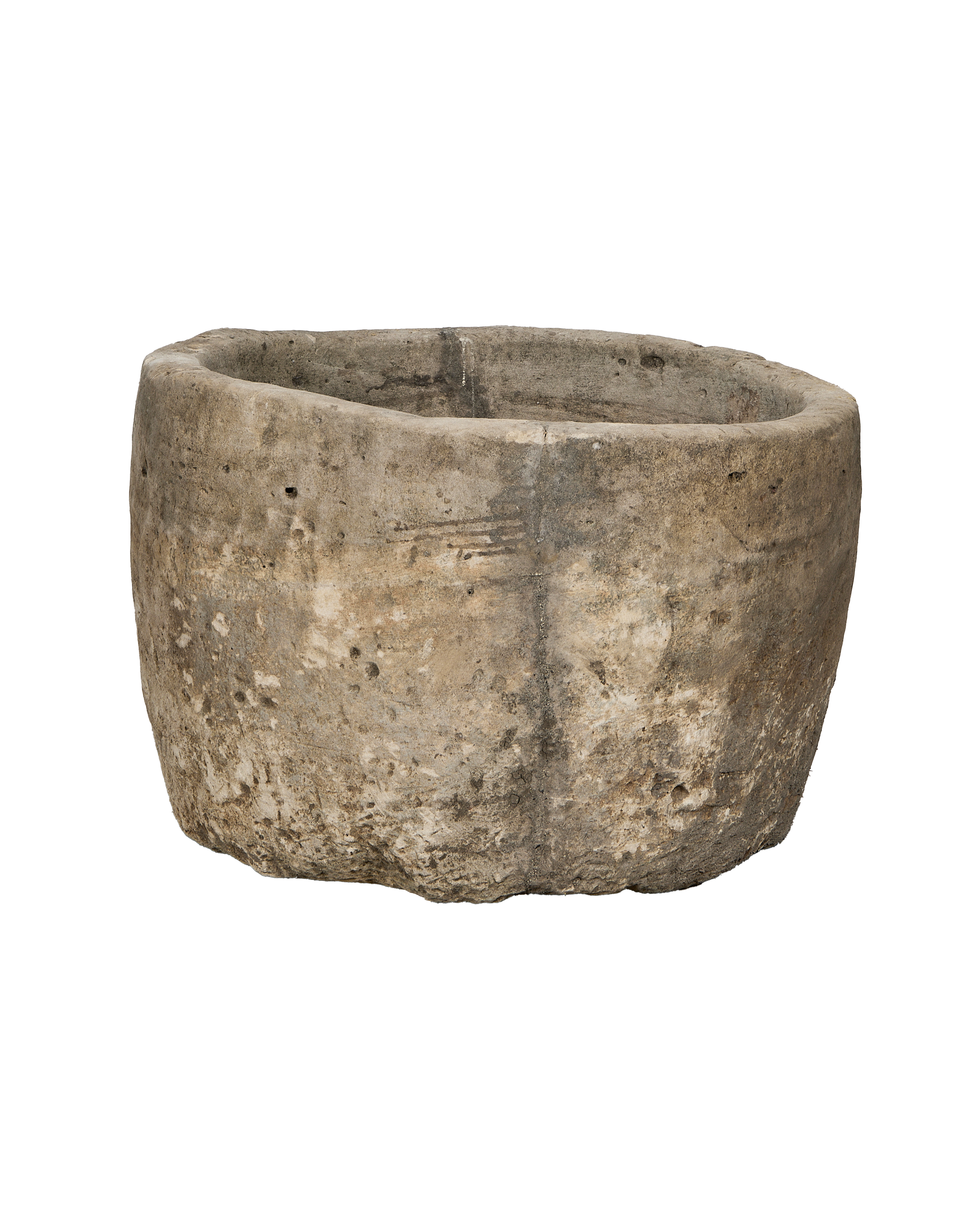 Vintage Indonesian limestone trough (OAK), slightly angled showing its weathered, porous texture.