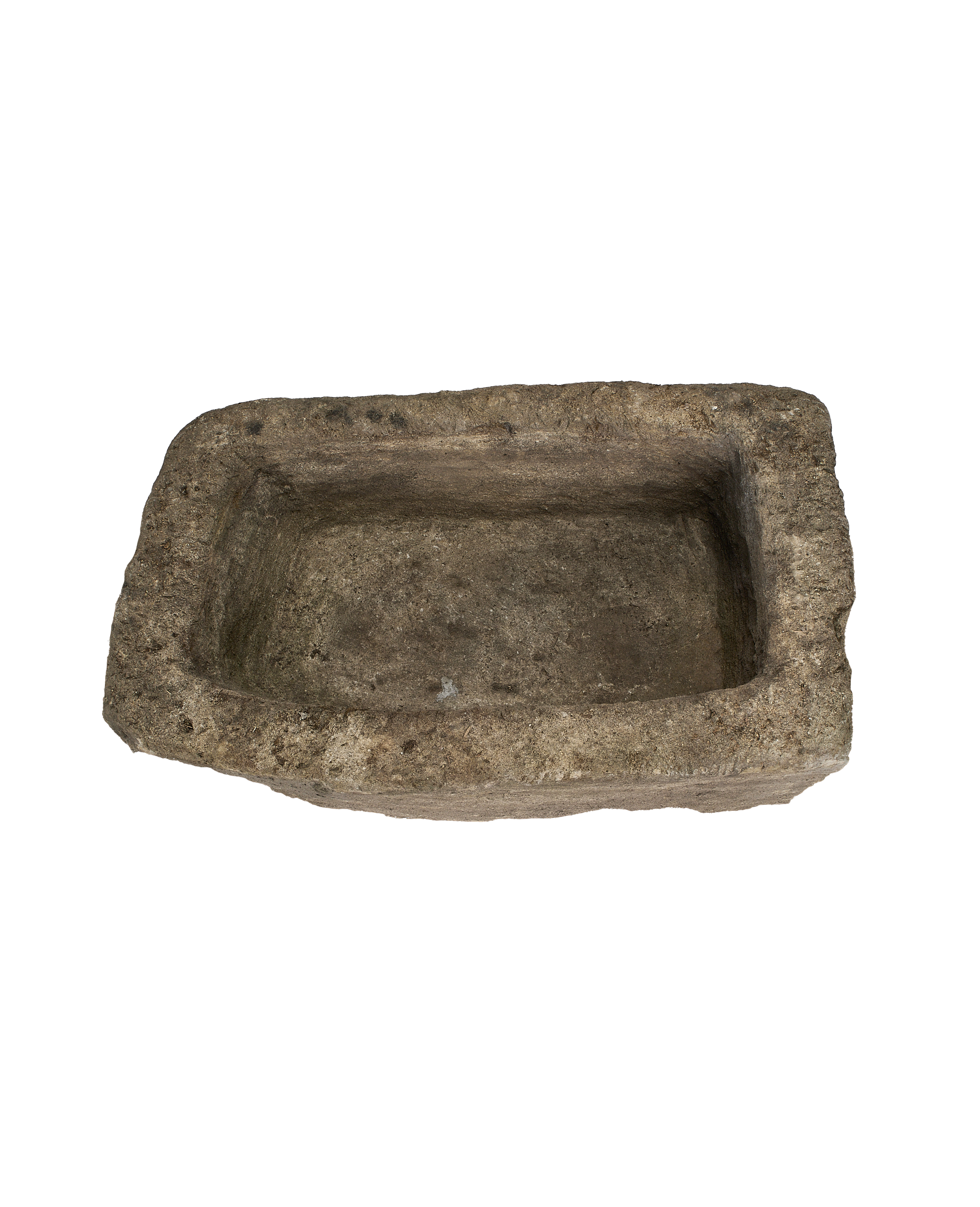 Vintage rectangular limestone trough, showing the rustic, weathered texture of ancient Indonesian stone.