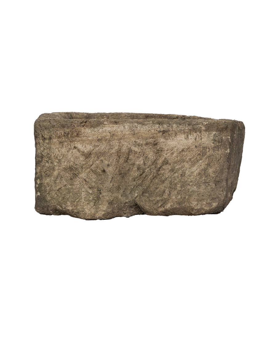 Vintage Indonesian rectangular limestone trough showing texture, rough-hewn exterior, and weathered OAK finish.