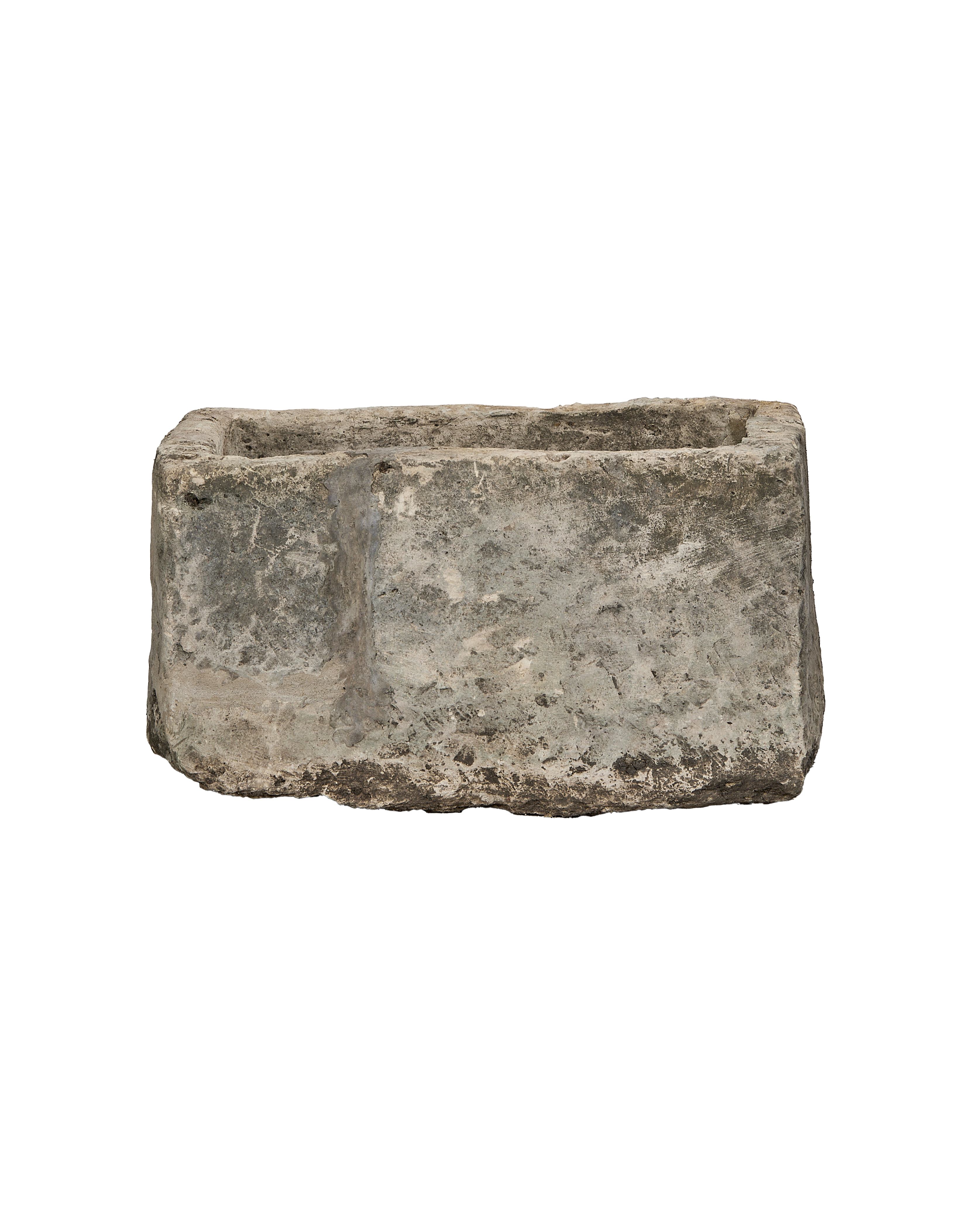 Vintage rectangular Indonesian limestone trough with weathered grey patina on black background.