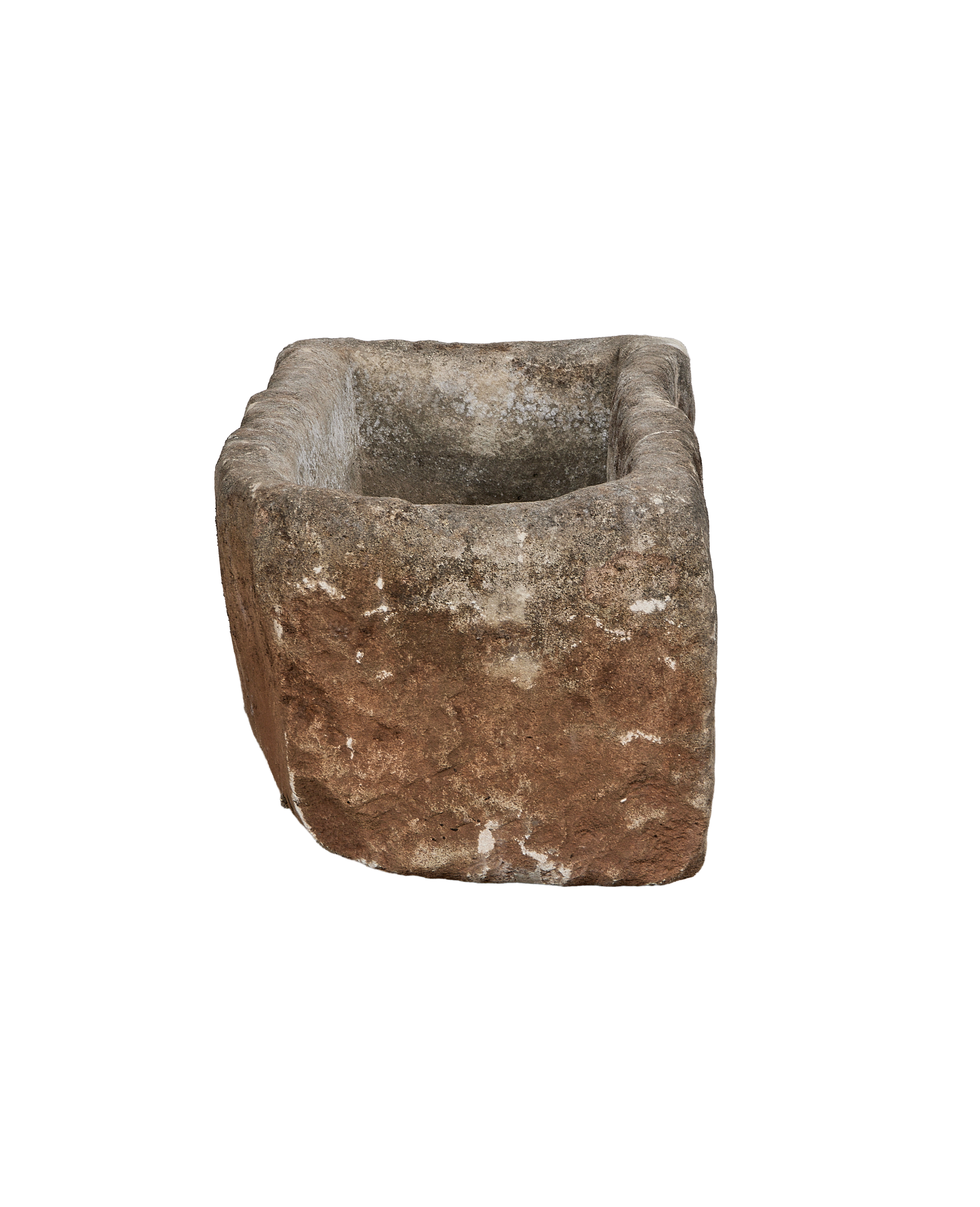 Vintage Indonesian limestone trough, angled view, showcasing rustic texture and weathered condition.
