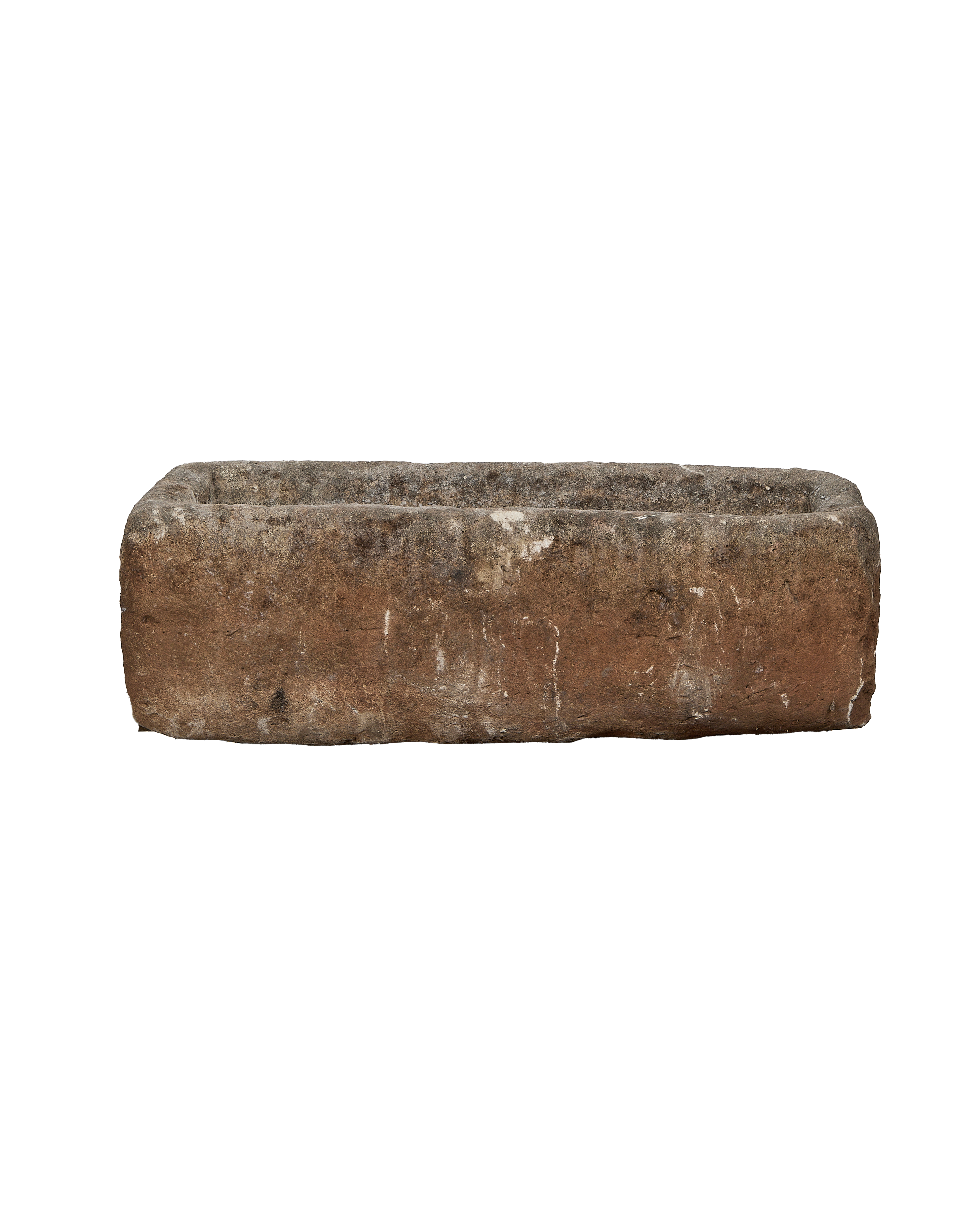 Vintage Indonesian rectangular limestone trough showing rough-hewn side texture and aged patina.