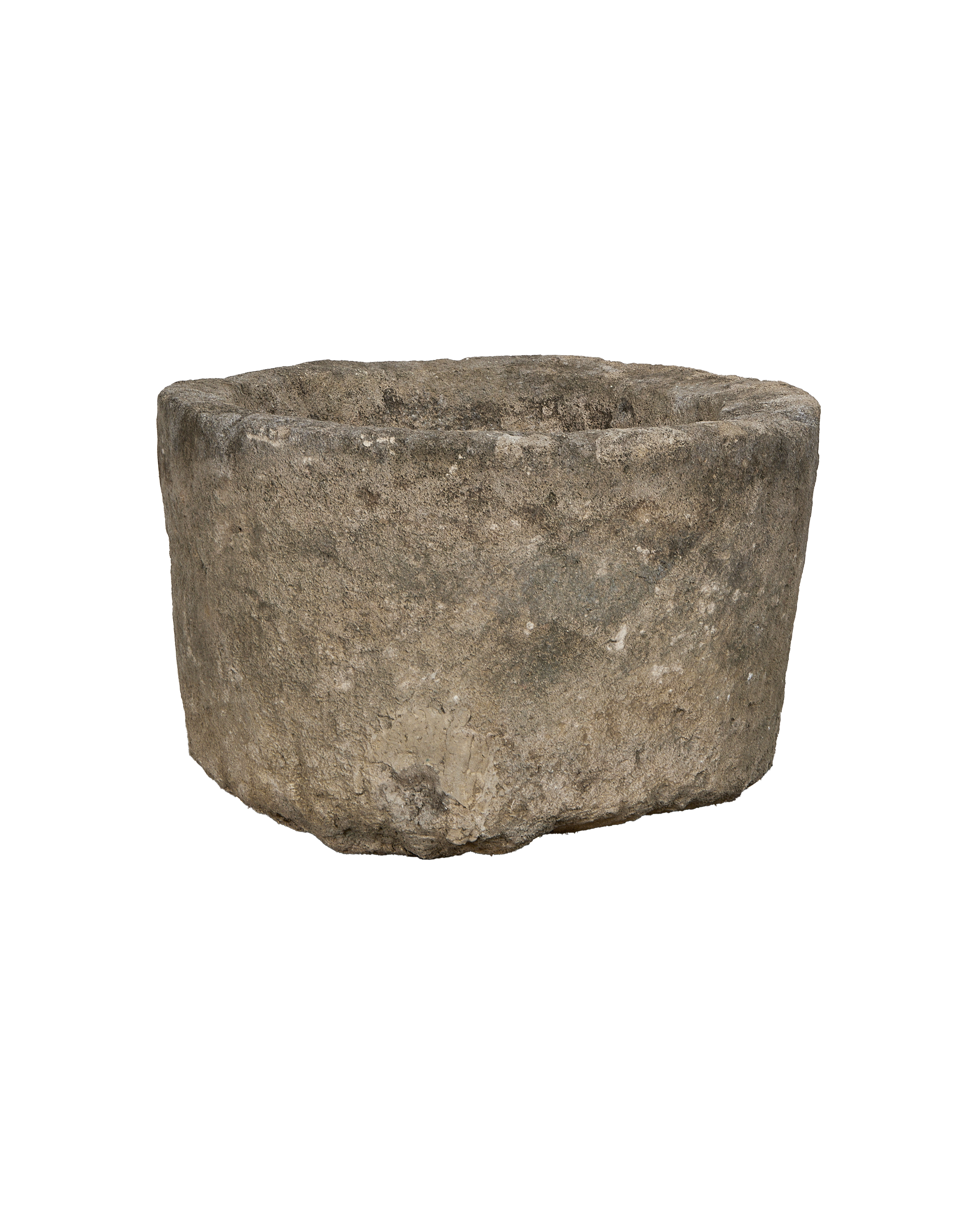 Vintage round limestone trough, aged texture, from Indonesia, close-up side perspective.