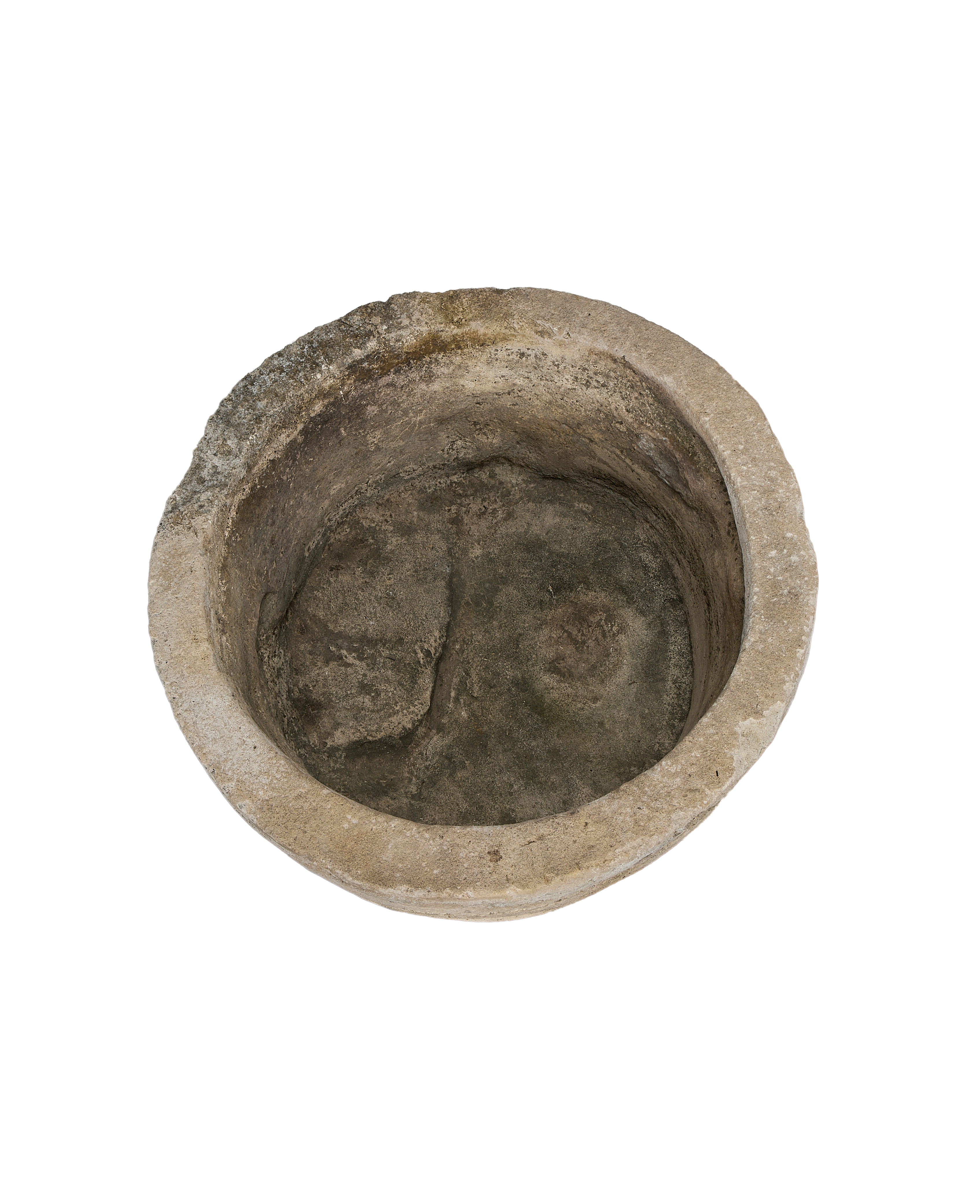 Vintage Indonesian limestone trough, top view showing weathered, deep round interior.