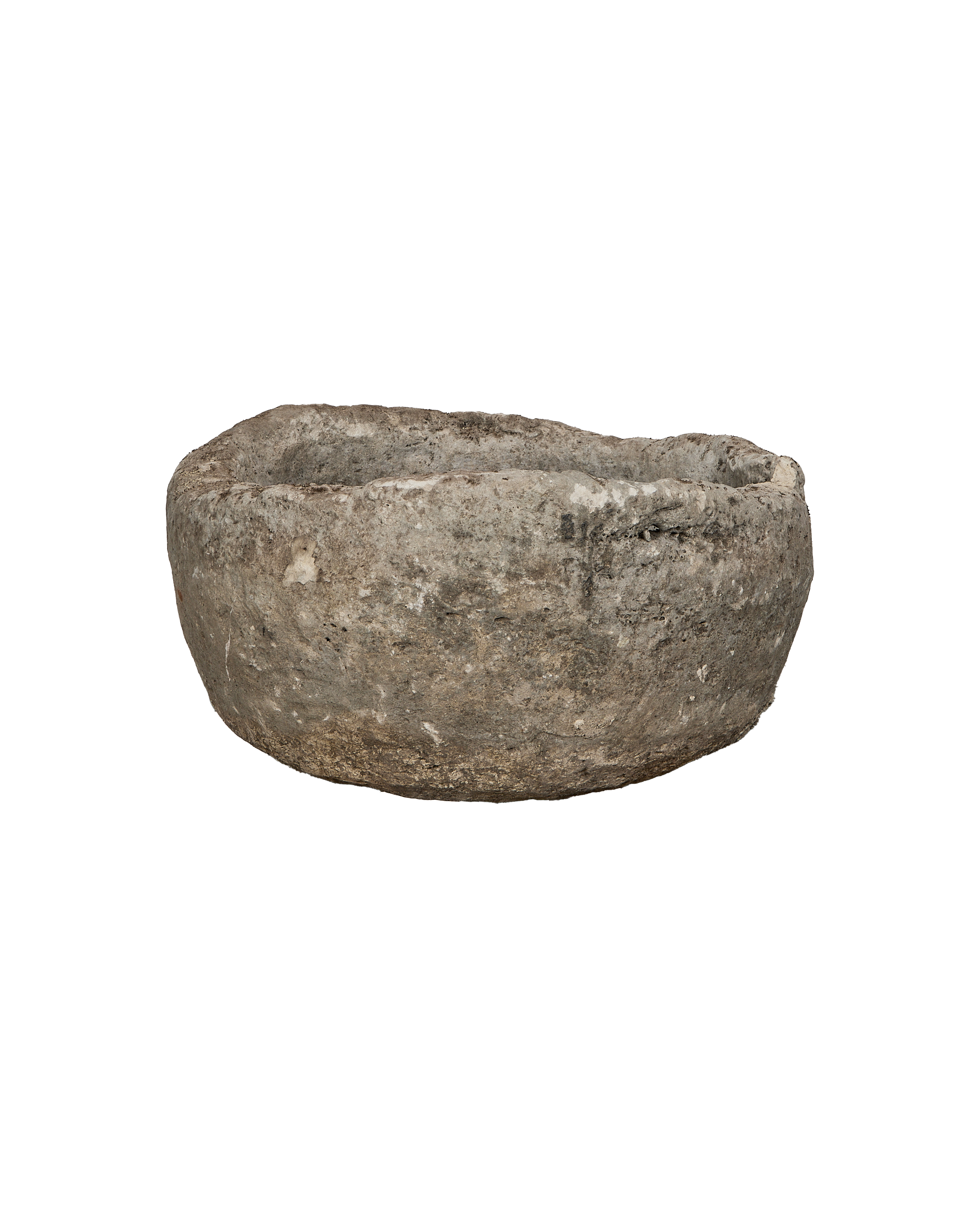 Vintage round limestone trough, side view revealing rough texture imported from Indonesia.
