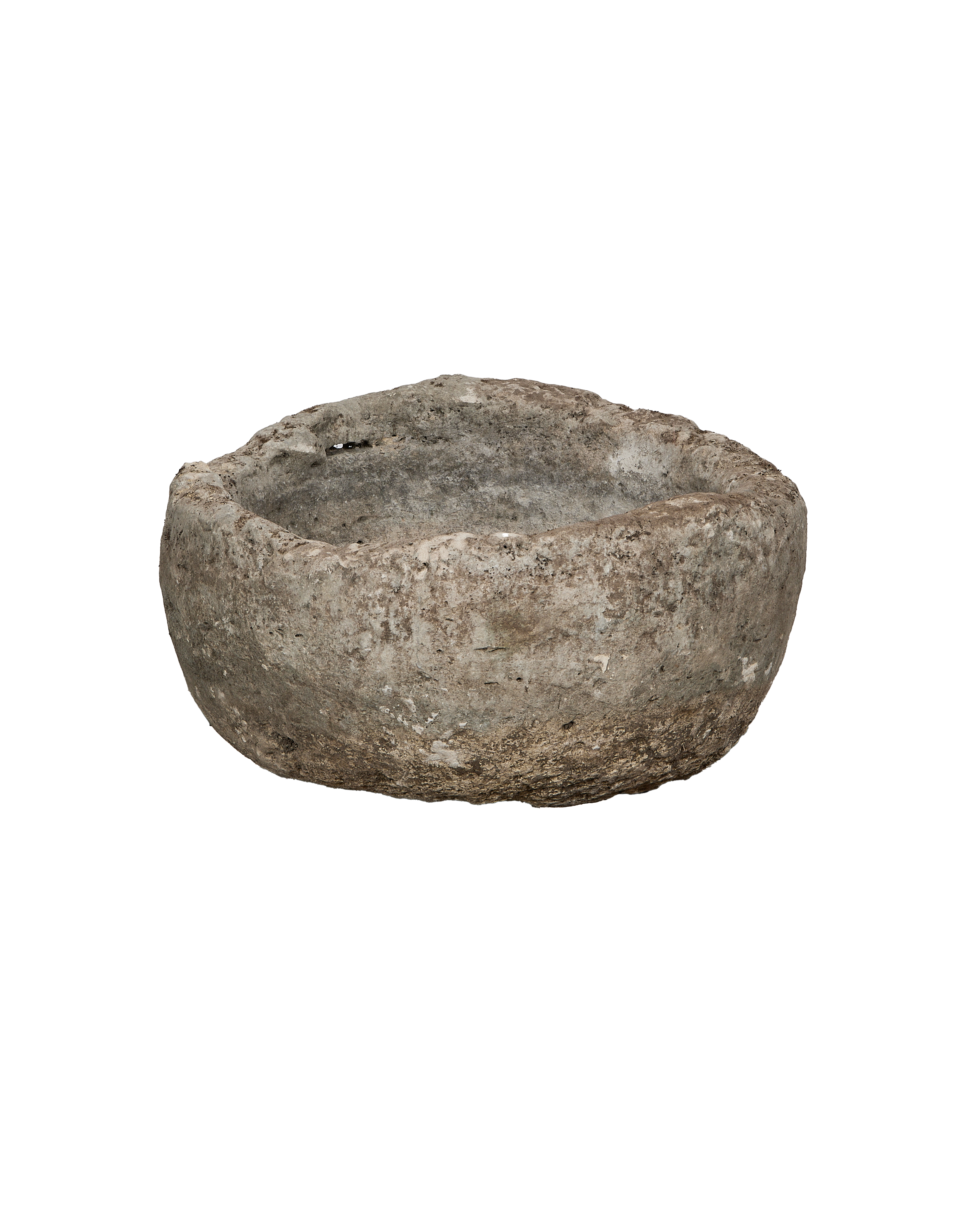 Vintage Indonesian limestone trough (OAK model) in a round shape, showing natural rough texture.