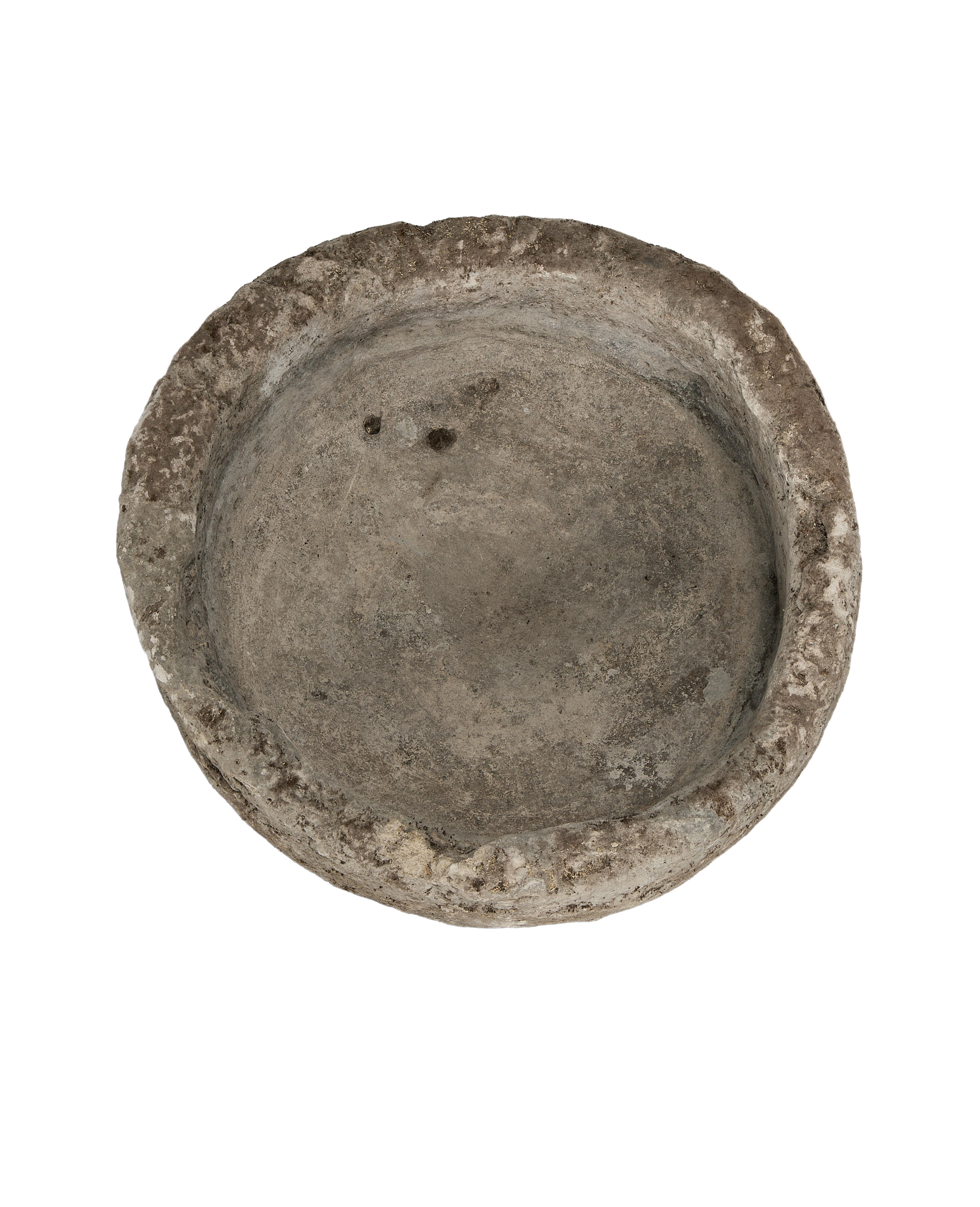 Vintage round Indonesian limestone trough, top-down view showing interior and weathered rim.