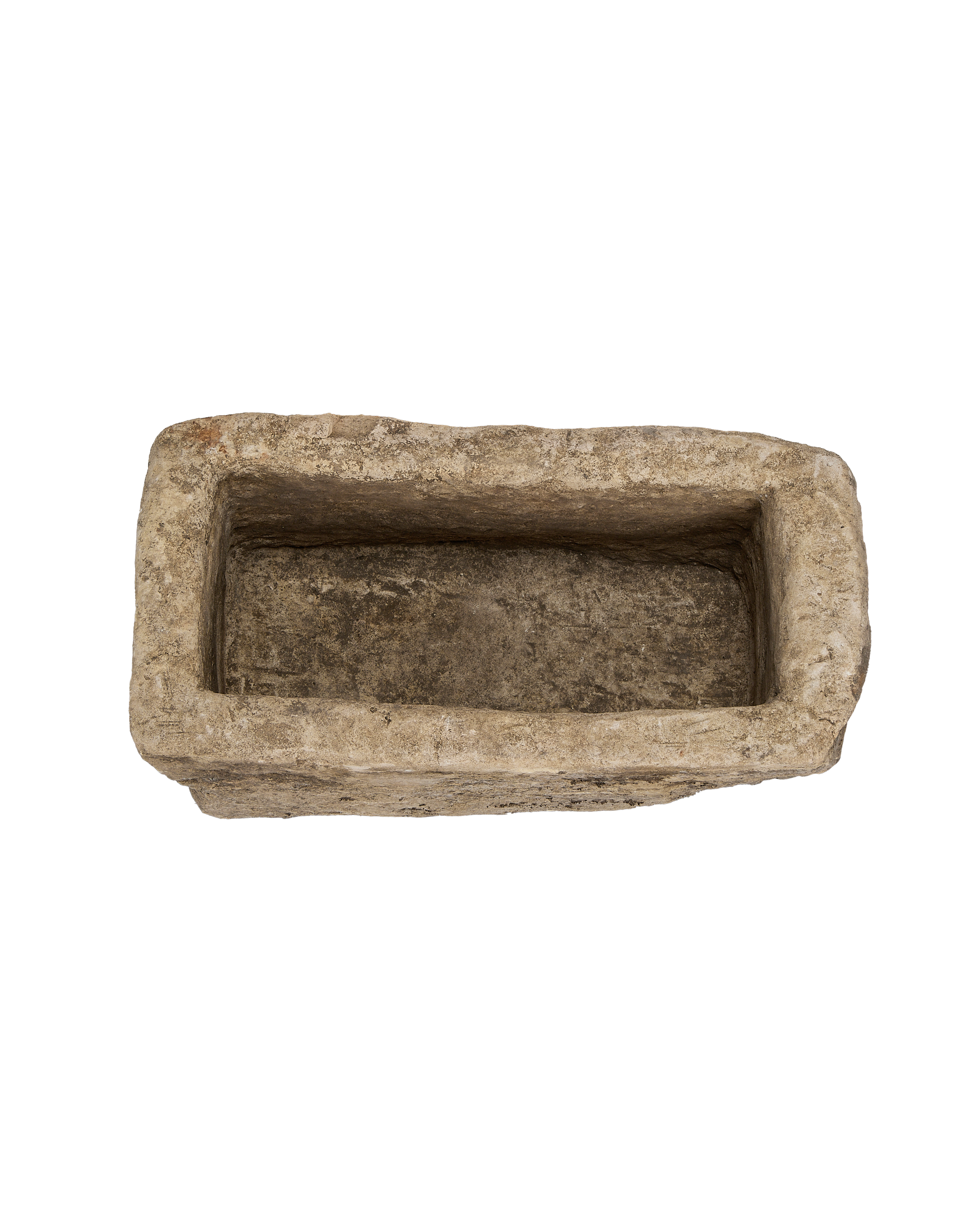 Vintage Indonesian limestone rectangular trough, top-down view showing interior depth and rough texture.