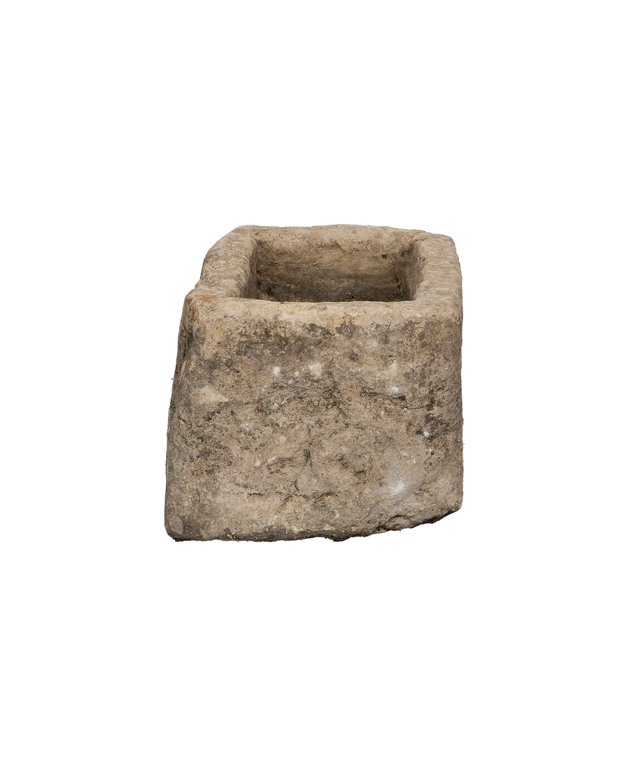 Vintage Indonesian rectangular limestone trough, close-up of textured exterior showing natural aging and patina.