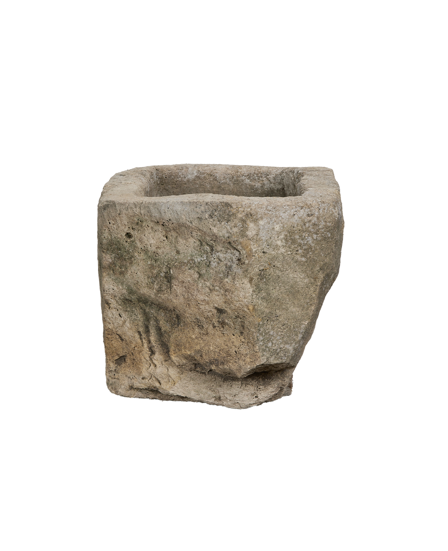 Vintage Indonesian oblong limestone trough, exterior side view highlighting aged texture and natural imperfections.