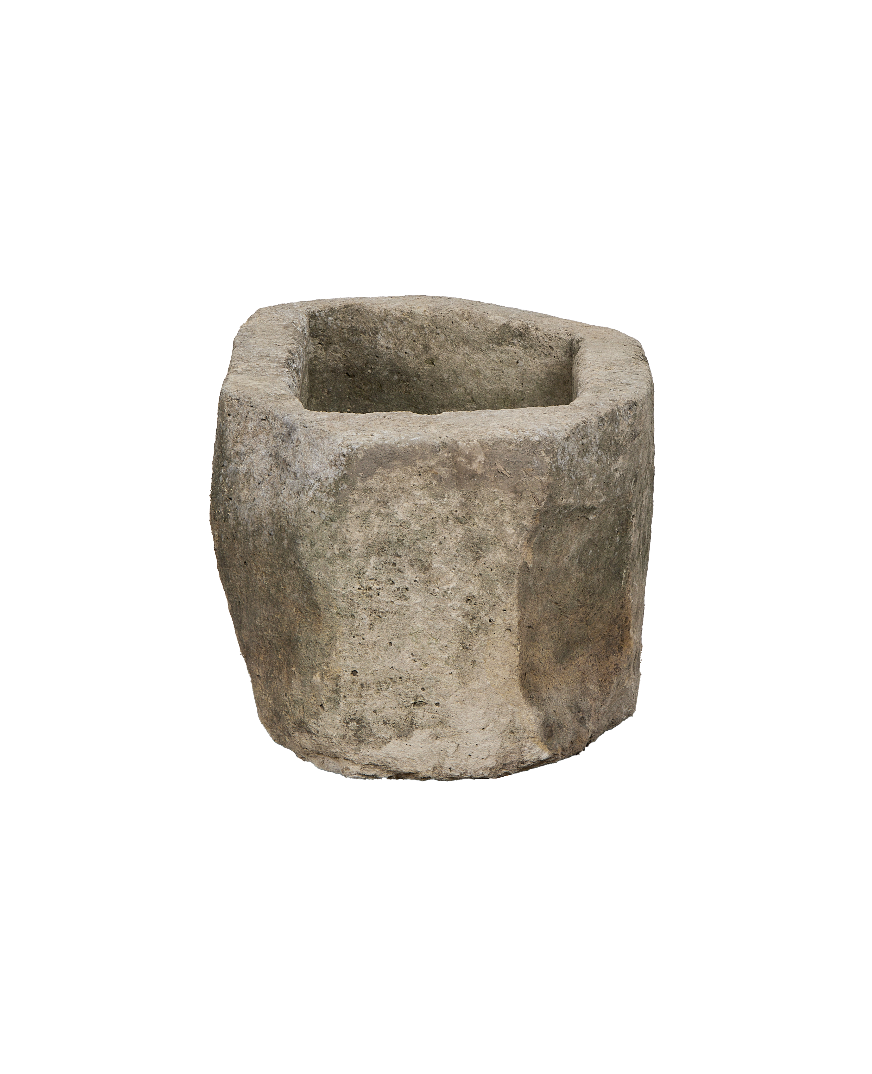 Vintage oblong Indonesian limestone trough showing weathered exterior texture and robust form.