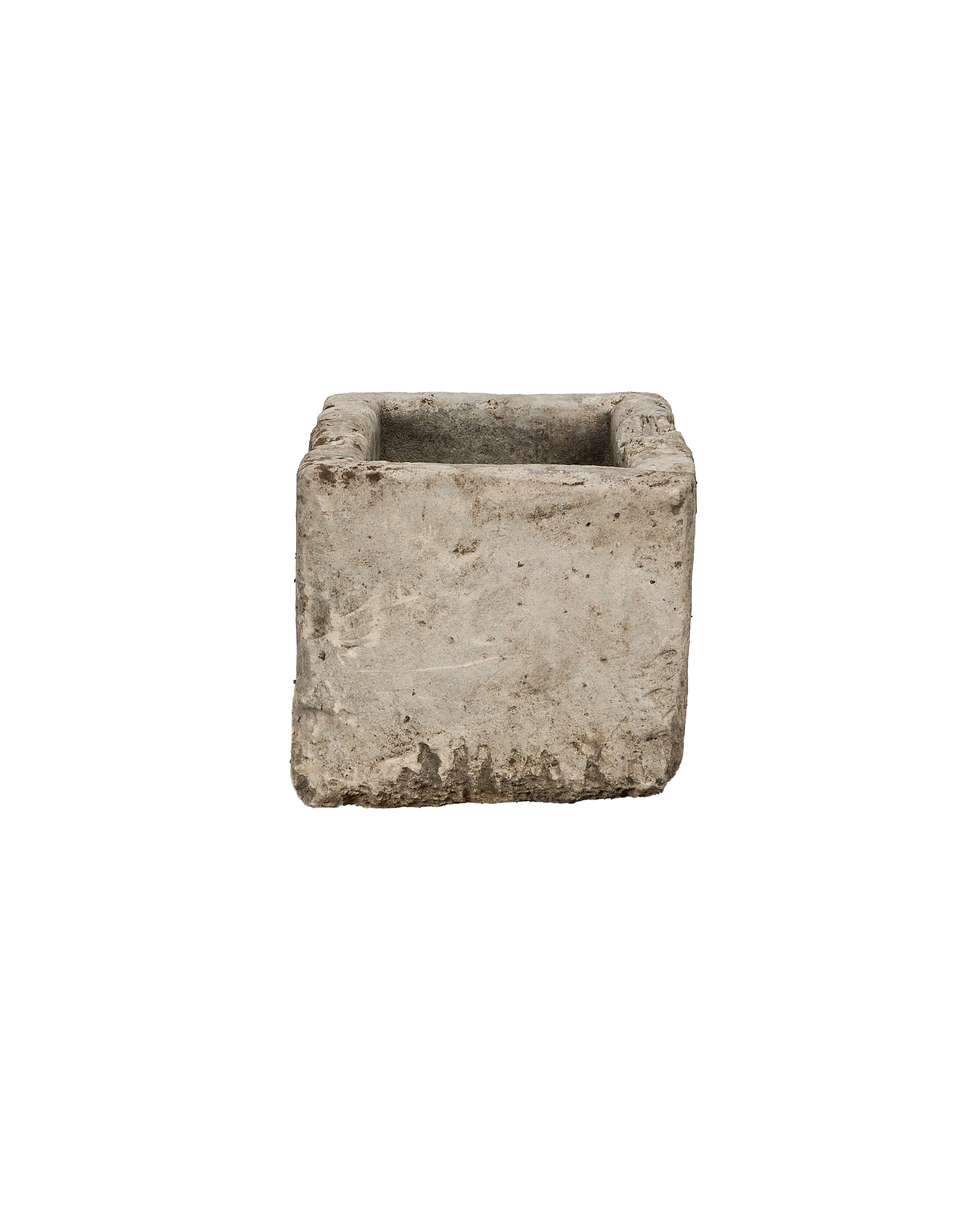 Vintage Indonesian limestone trough closeup, featuring rough texture and weathered antique gray surface.