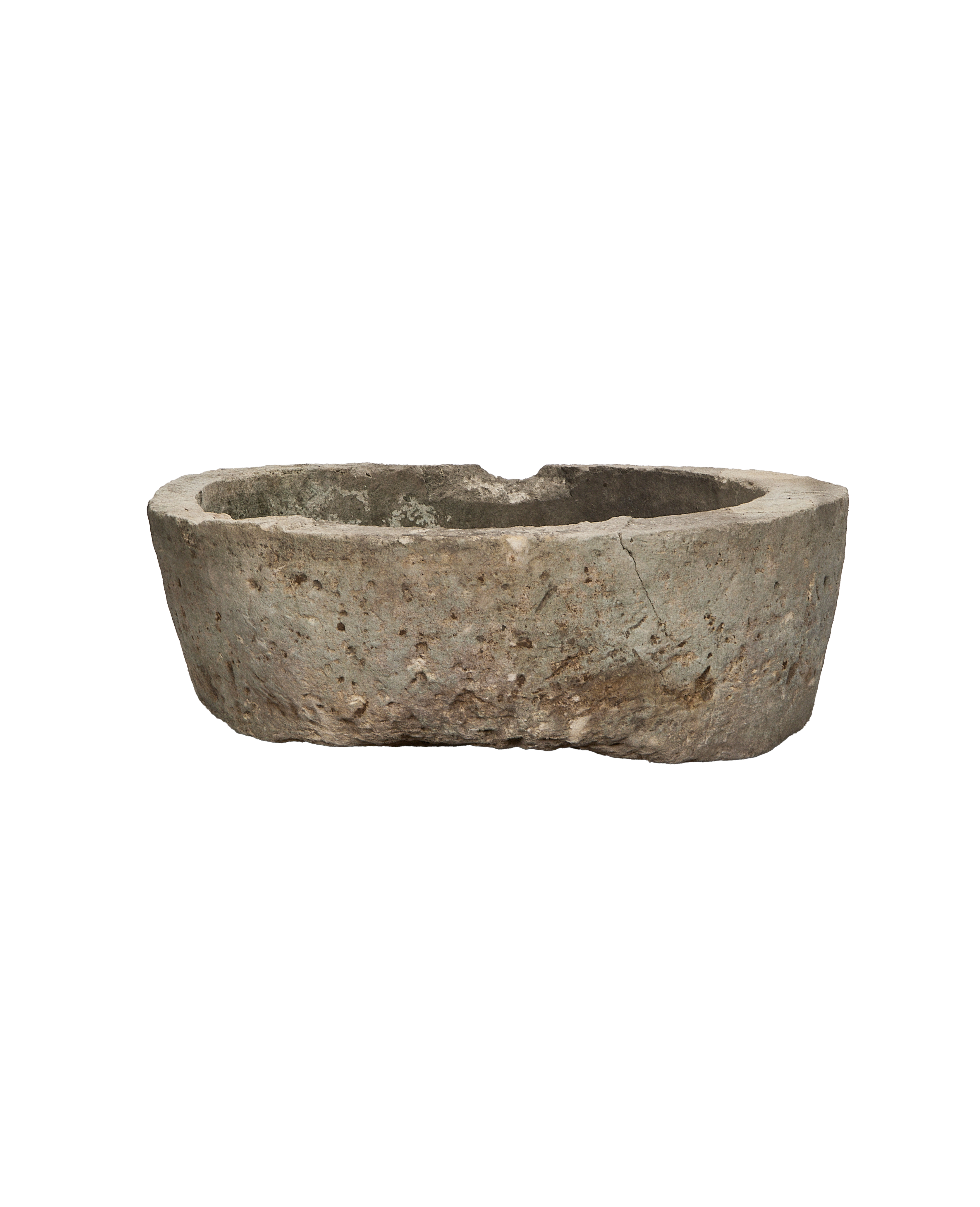 Vintage round Indonesian limestone trough, showing a shallow chip on the weathered rim.