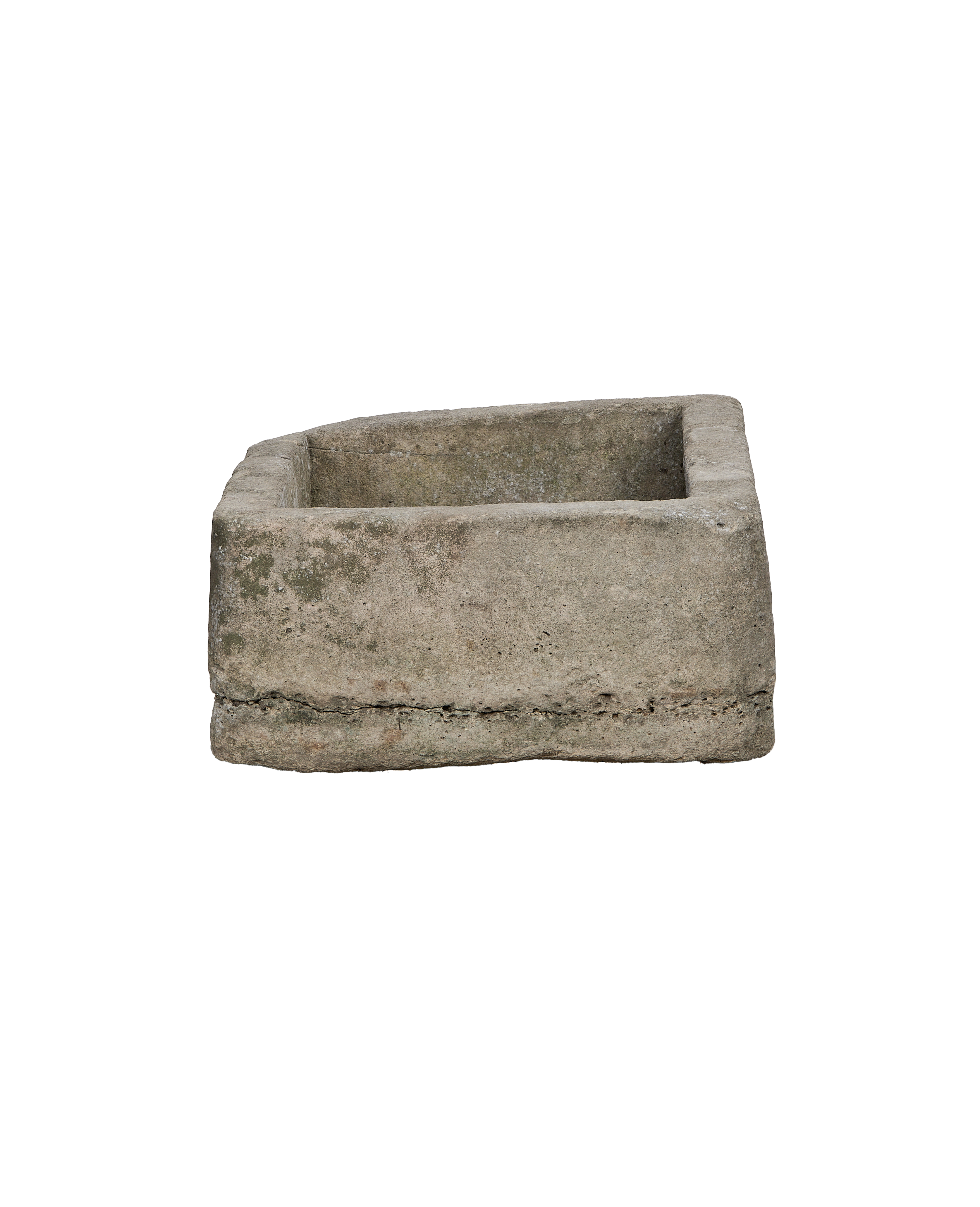 Vintage rectangular limestone trough, showing the side profile with rough texture and green moss patina.