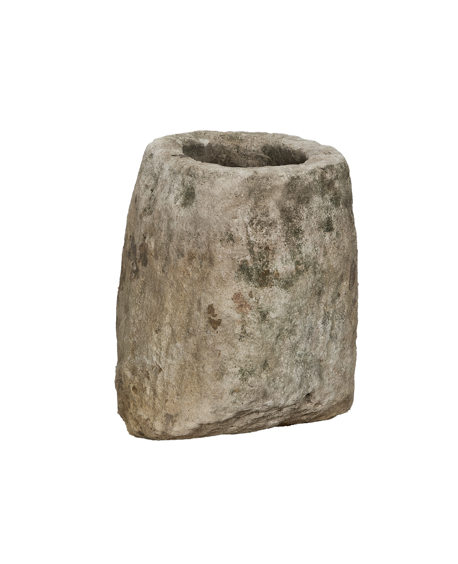 Vintage Indonesian limestone trough pot, weathered surface, darkened oblong opening, unique details.