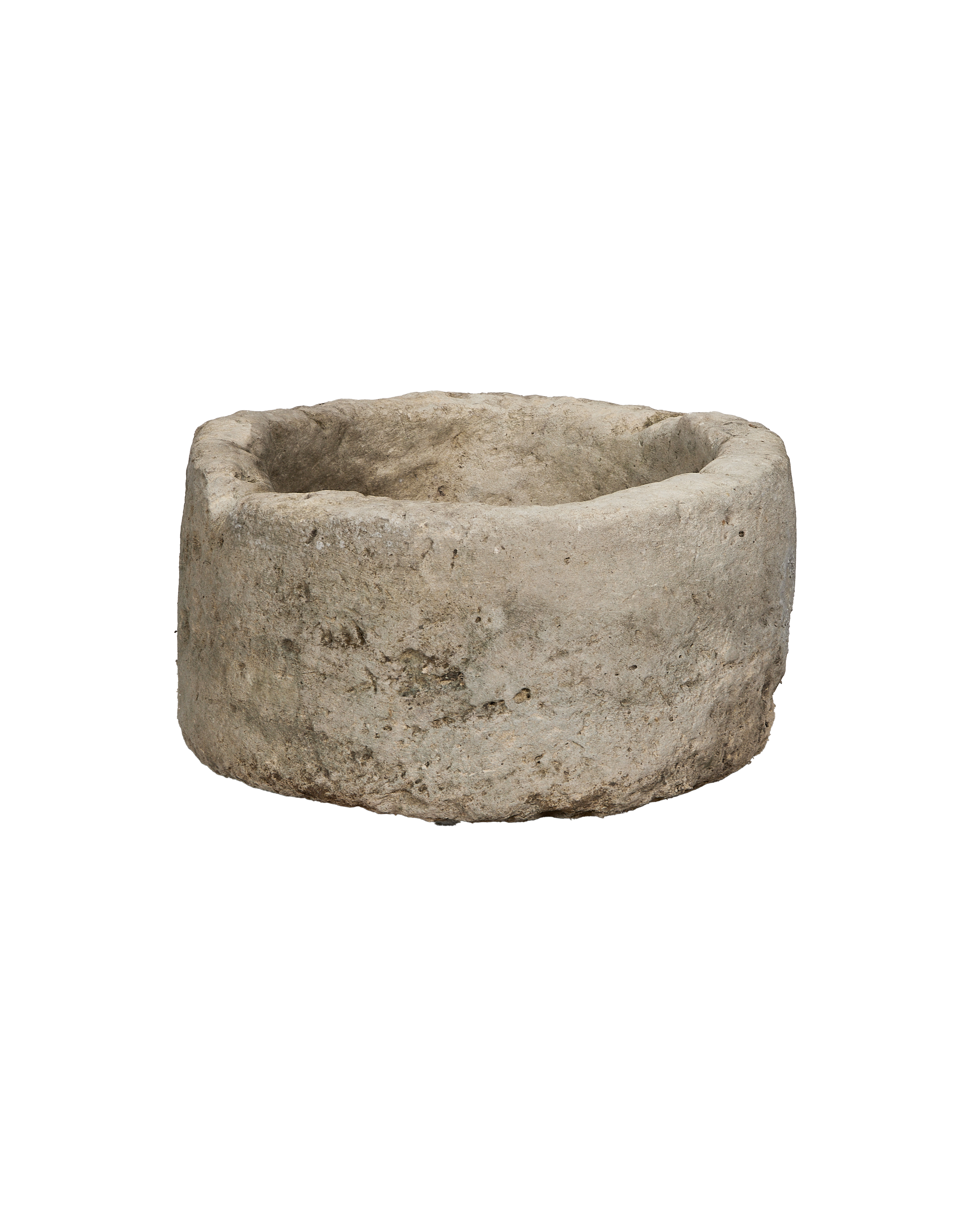 Vintage round Indonesian limestone trough, showing weathered side texture.