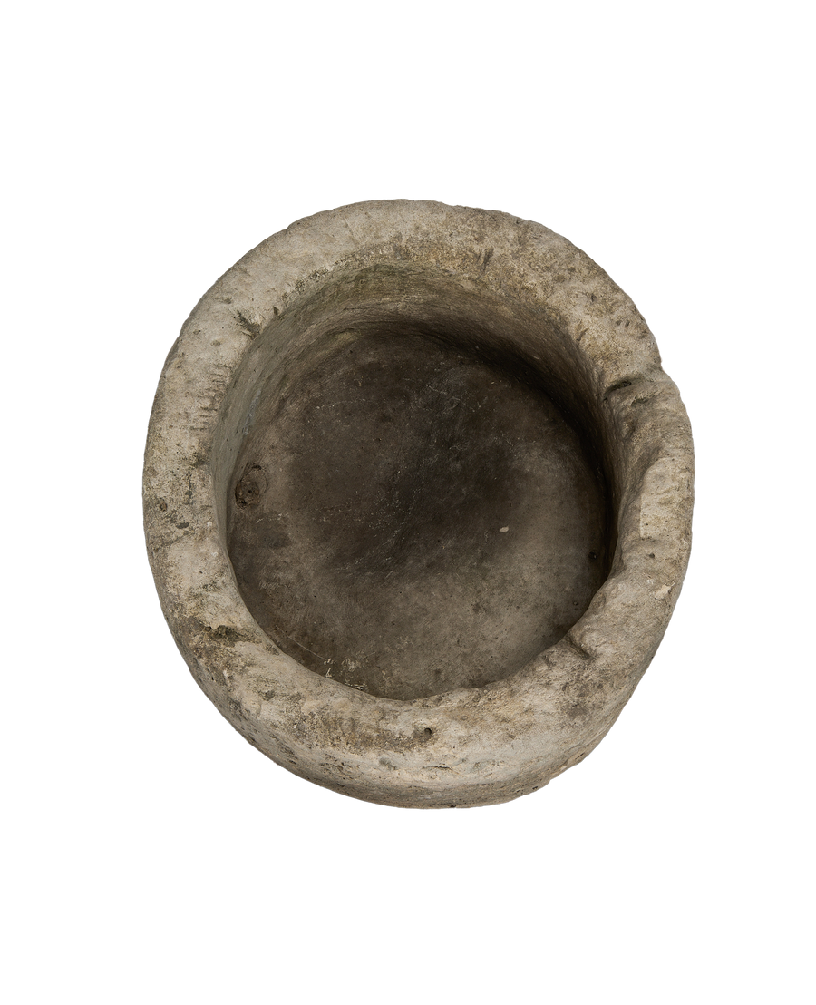 Vintage Indonesian round limestone trough, top-down view showing interior and weathered rim.