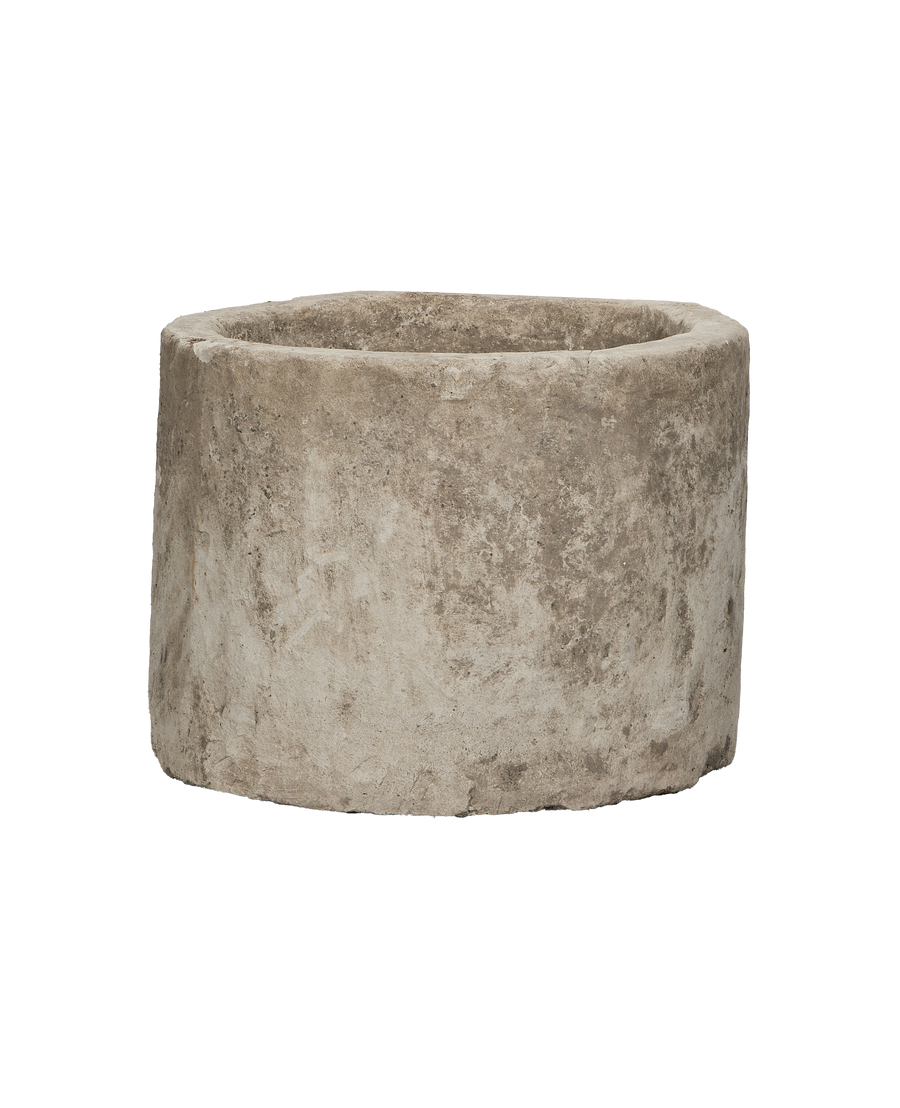 Vintage round limestone trough, Indonesia, showing rough, weathered exterior texture.