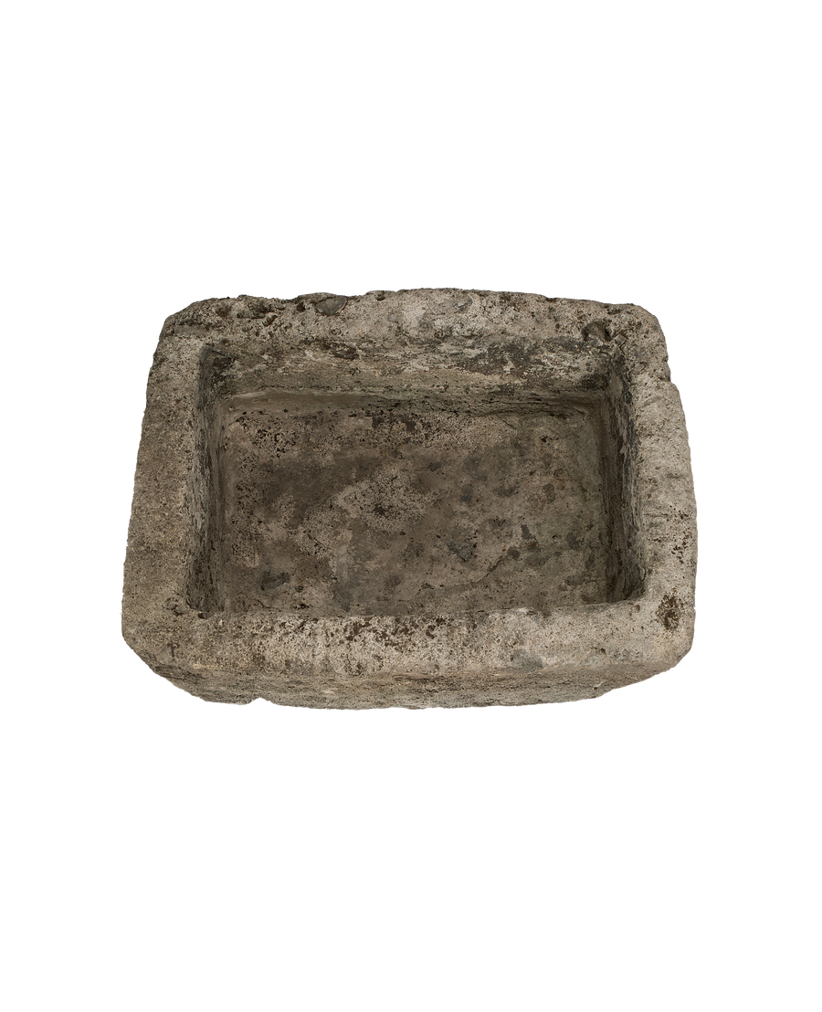 Vintage Indonesian limestone trough, rectangular, from top, showcasing aged surface and rough texture.