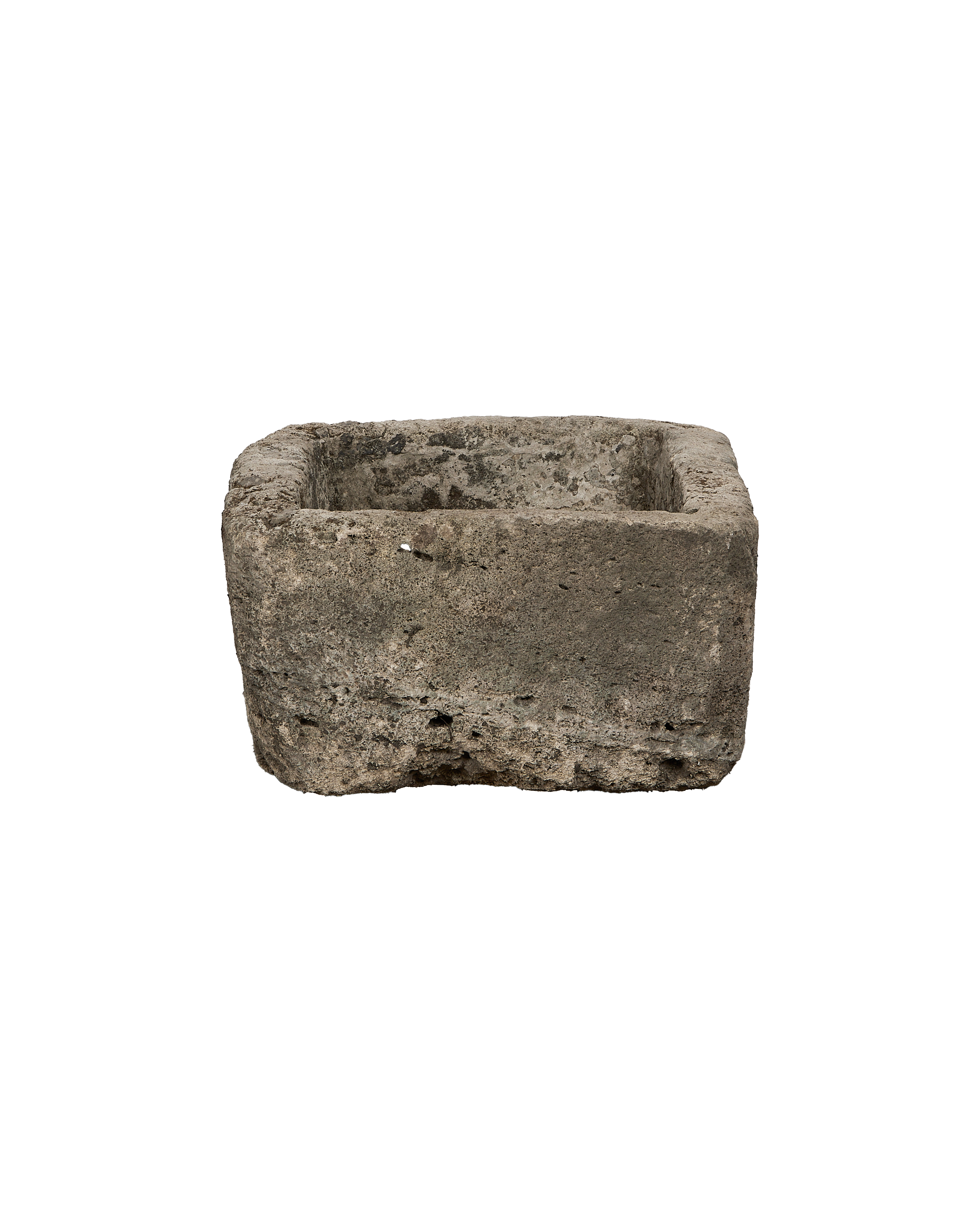 Vintage rectangular limestone trough, showing rough, weathered texture and porous surface detail.