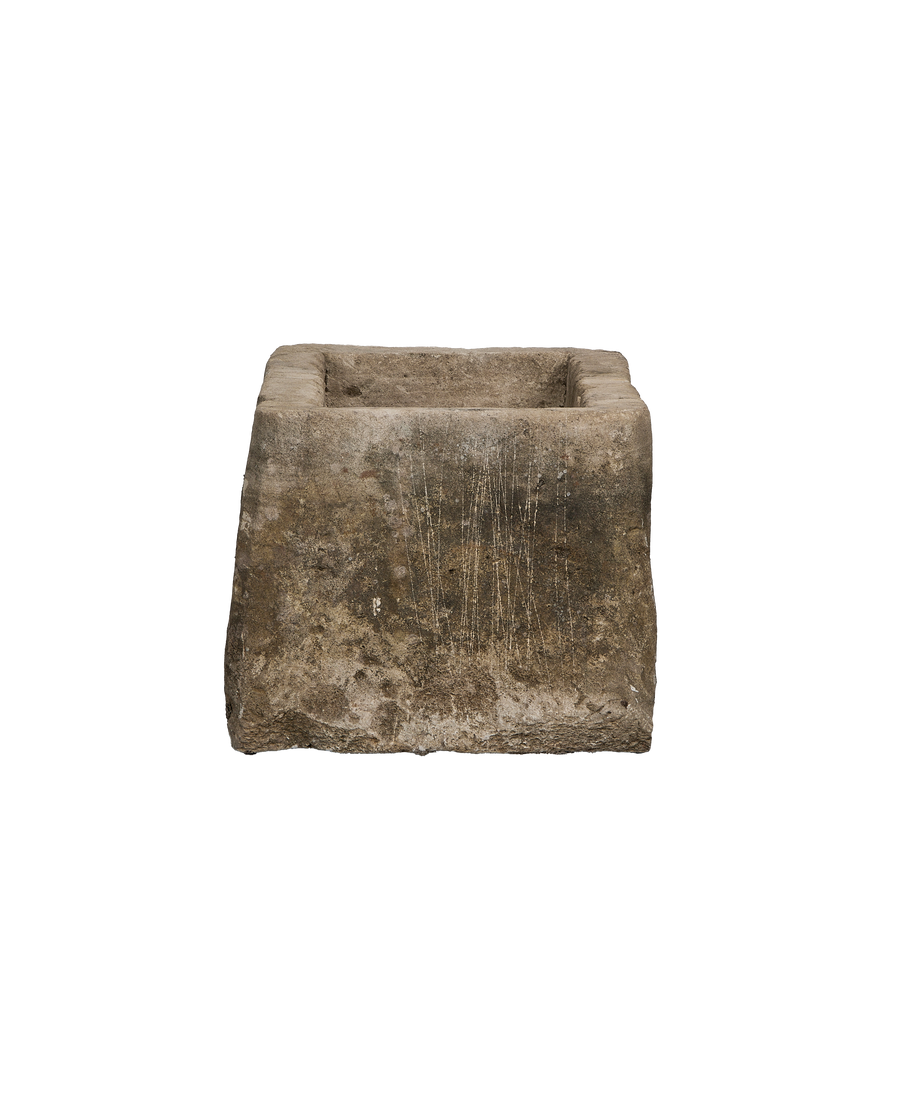 Vintage Indonesian limestone trough, rectangular, deeply weathered texture and surface scratches.