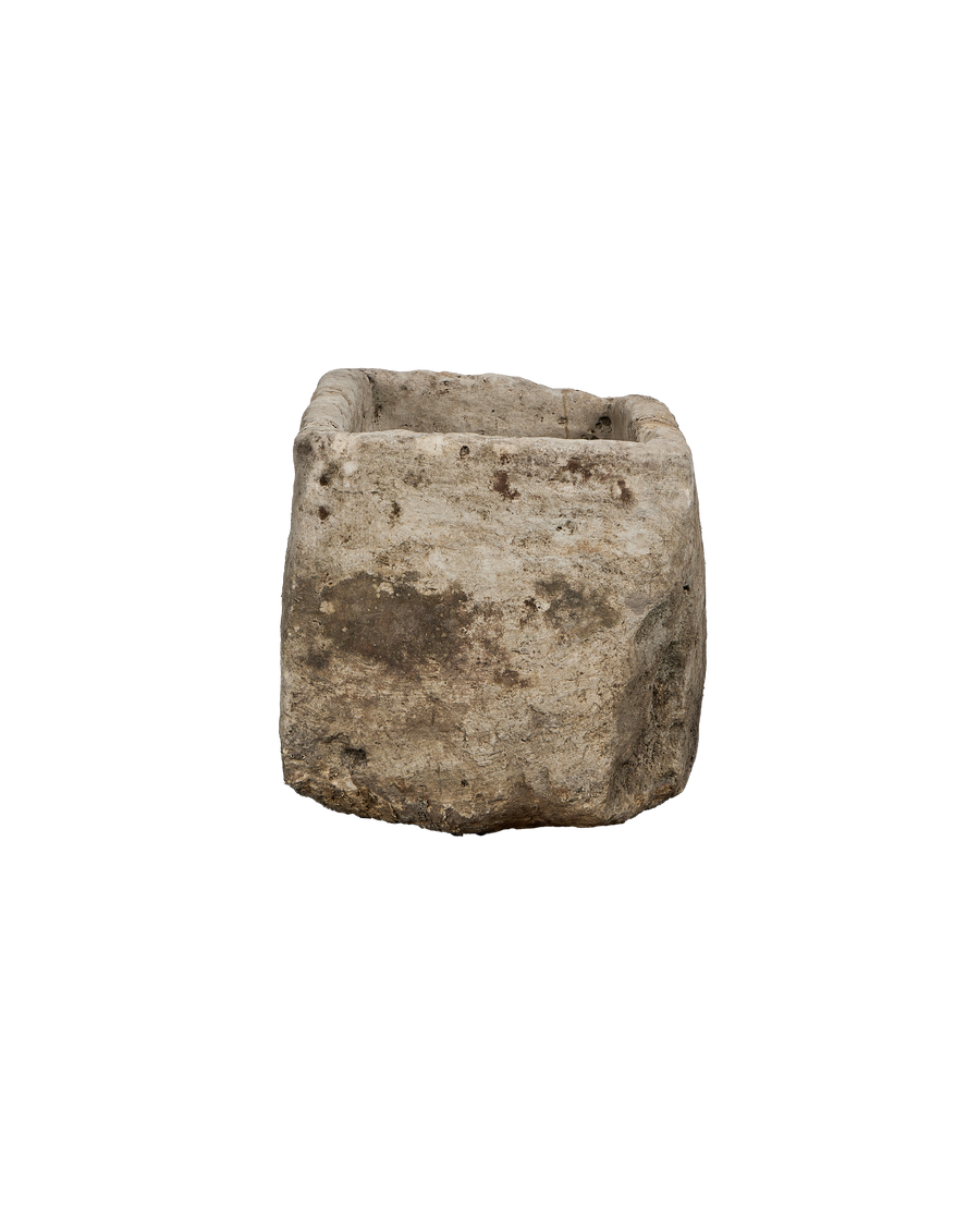 Vintage Indonesian rectangular limestone trough, rustic texture, weathered patina, seen from above.